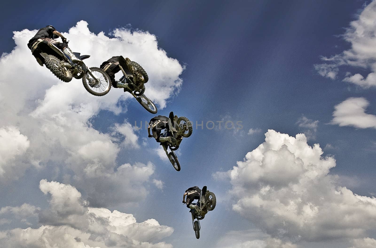 Freestyle motocross rider jumping.