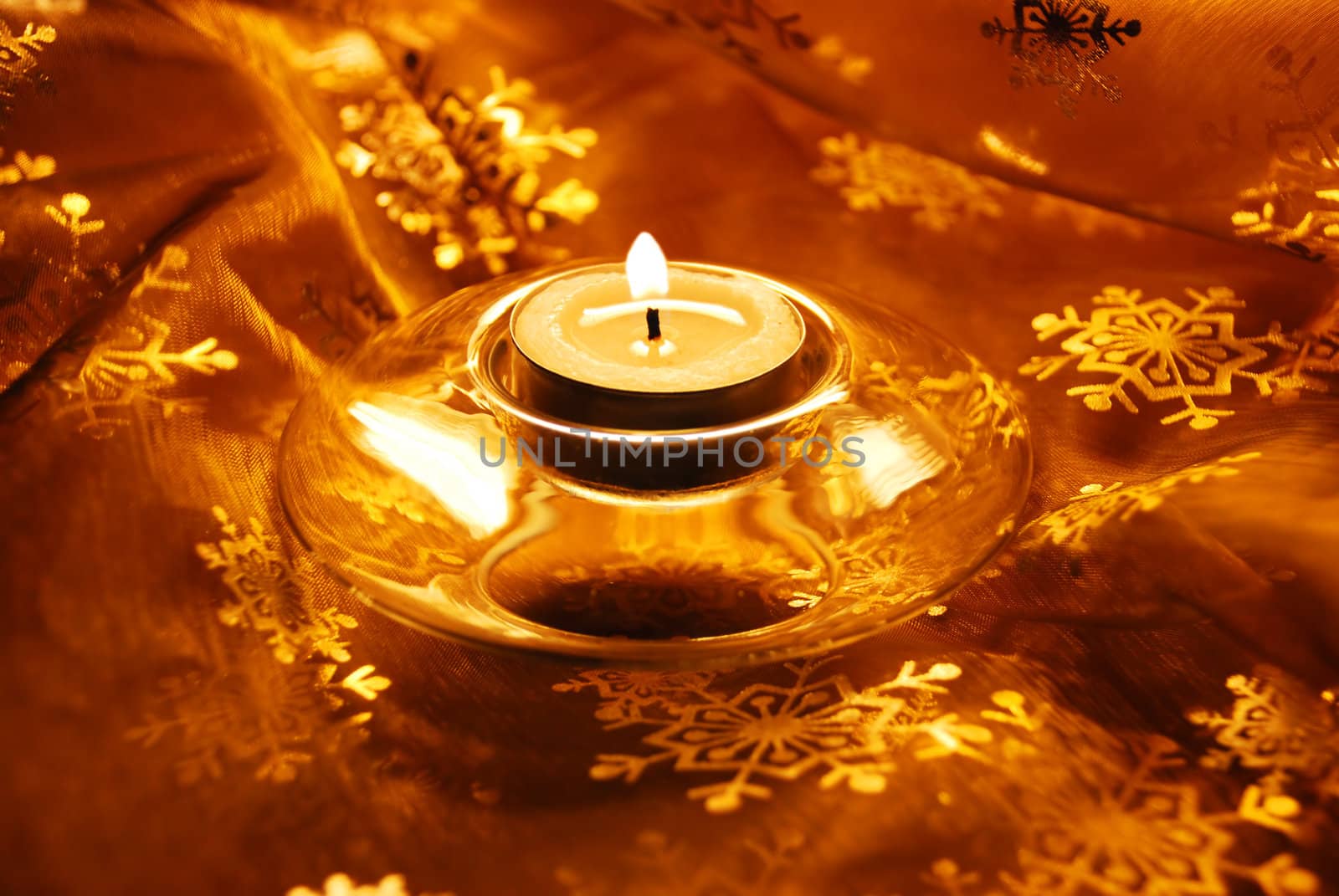 christmas decorative gold material with burning candle