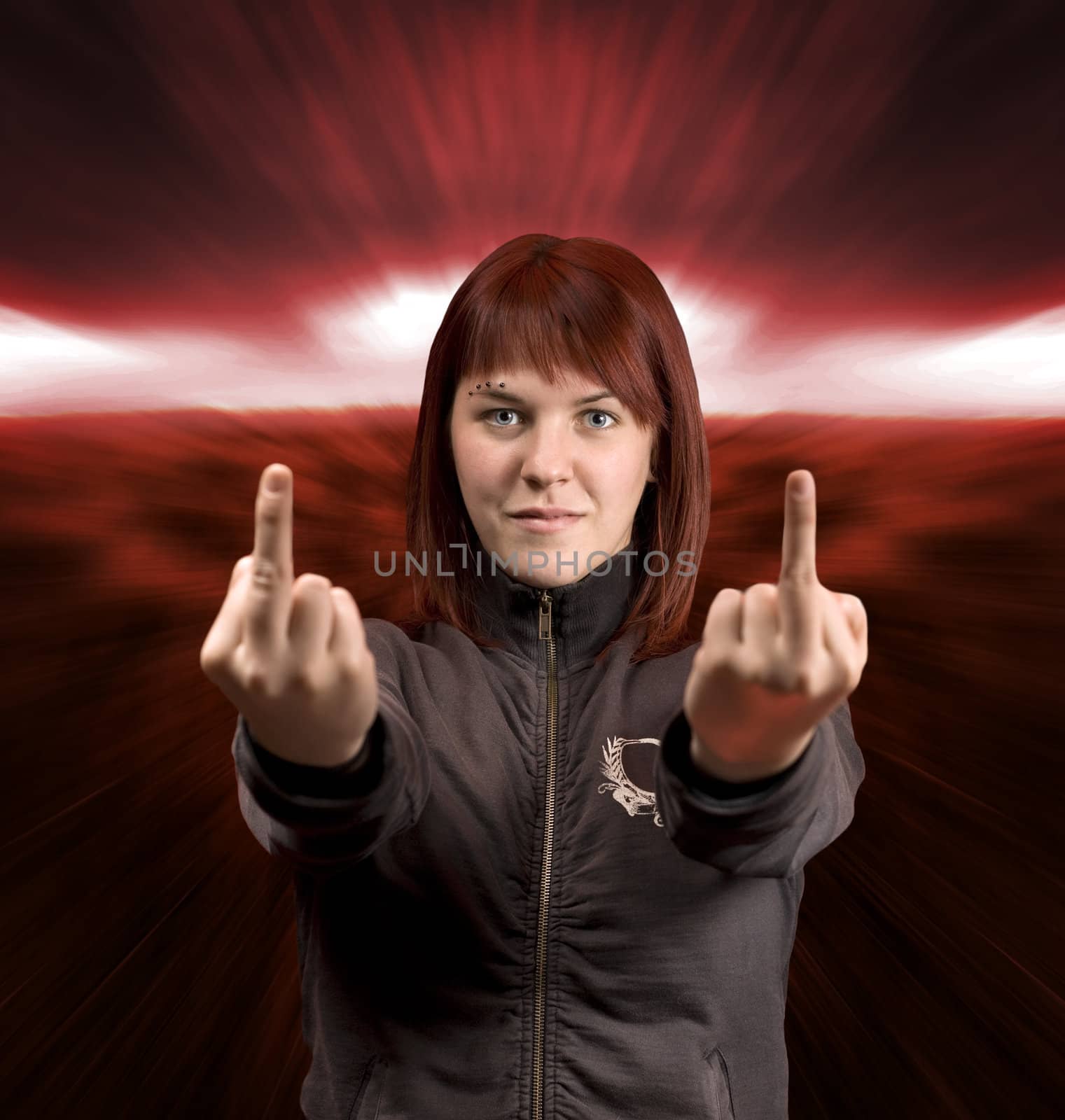 Redhead girl showing middle fingers with a dramatic apocalyptic background.