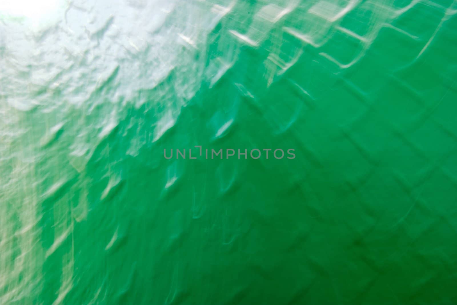 A green grid metal texture background