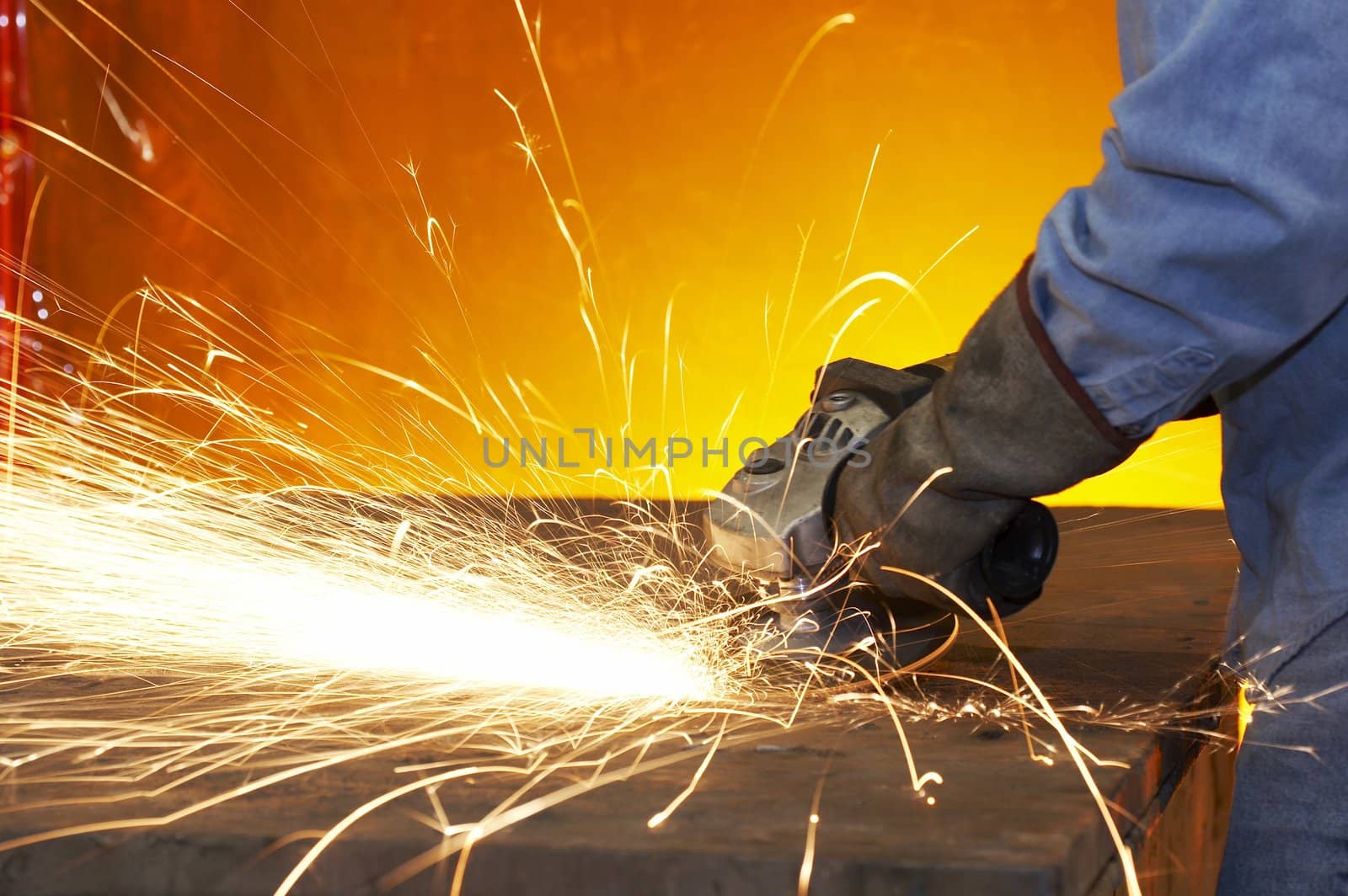 a close up picture of sparks on a grinding wheel