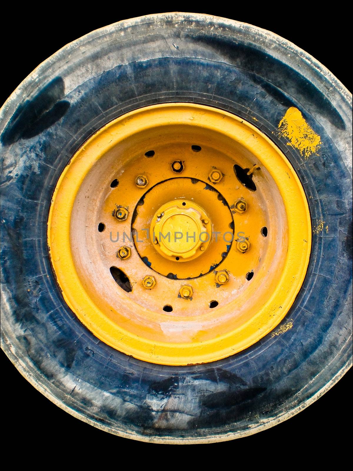 Stained truck tire on a black background