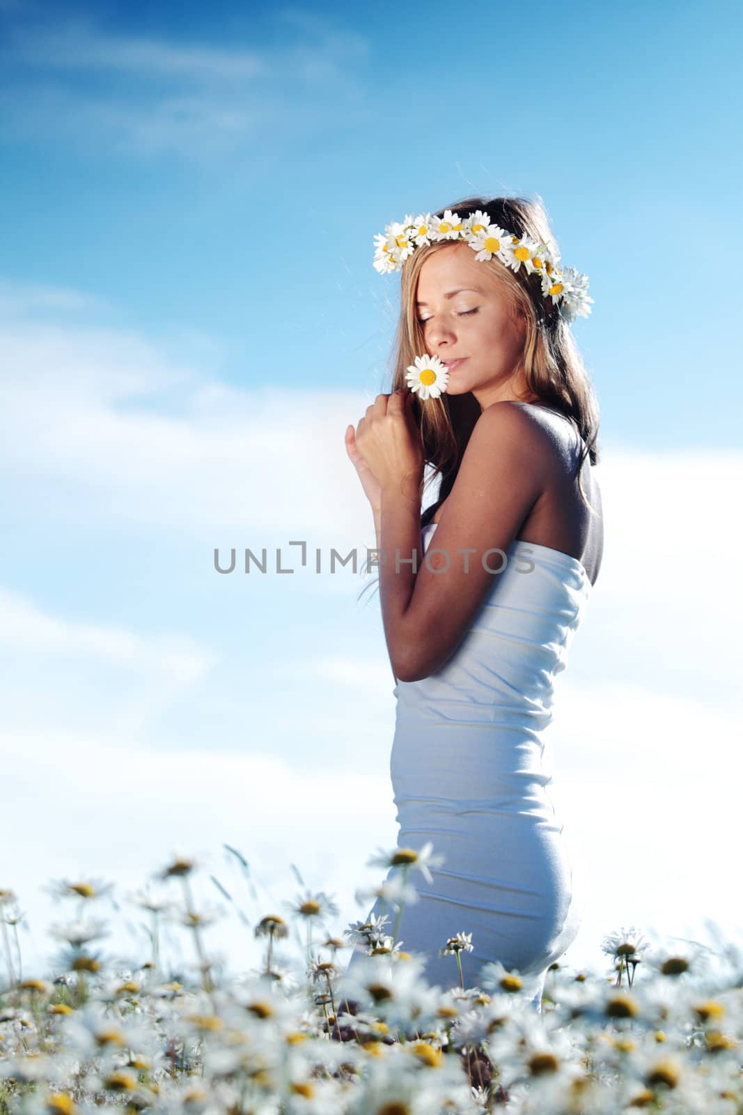 girl in dress on the daisy flowers field by Yellowj