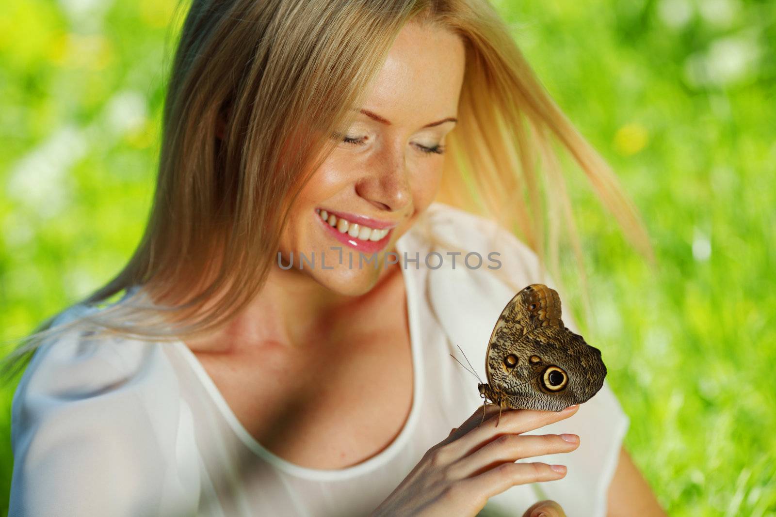 Woman playing with a butterfly by Yellowj