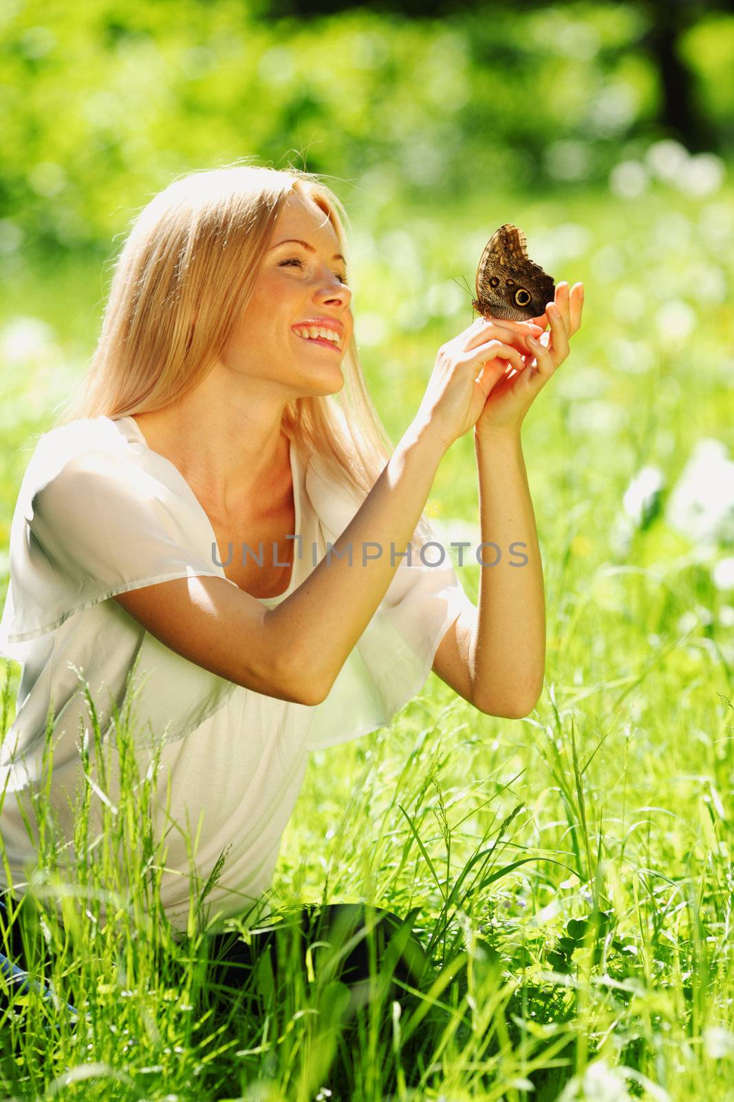 Woman playing with a butterfly by Yellowj