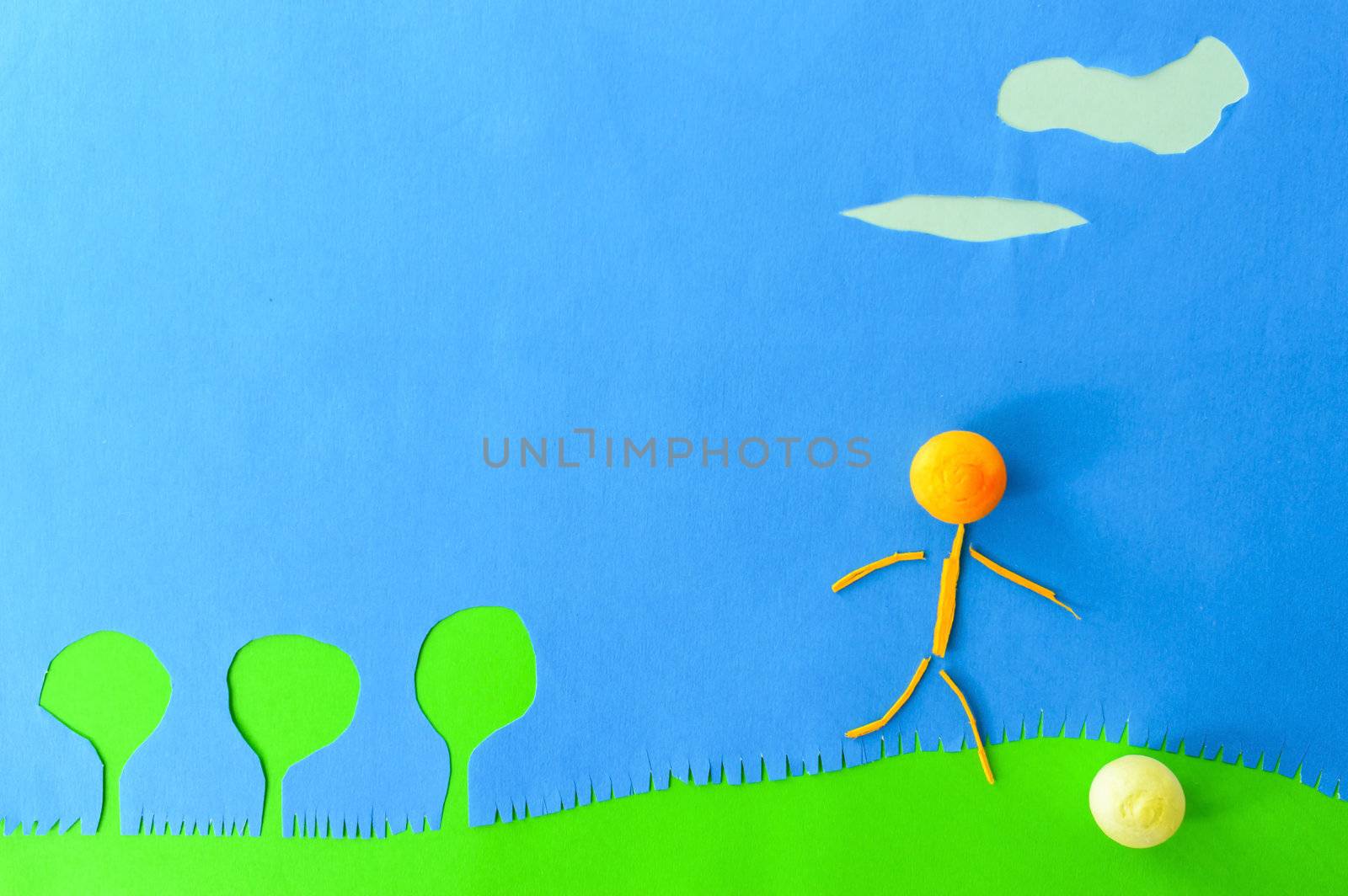 child playing ball on blue background