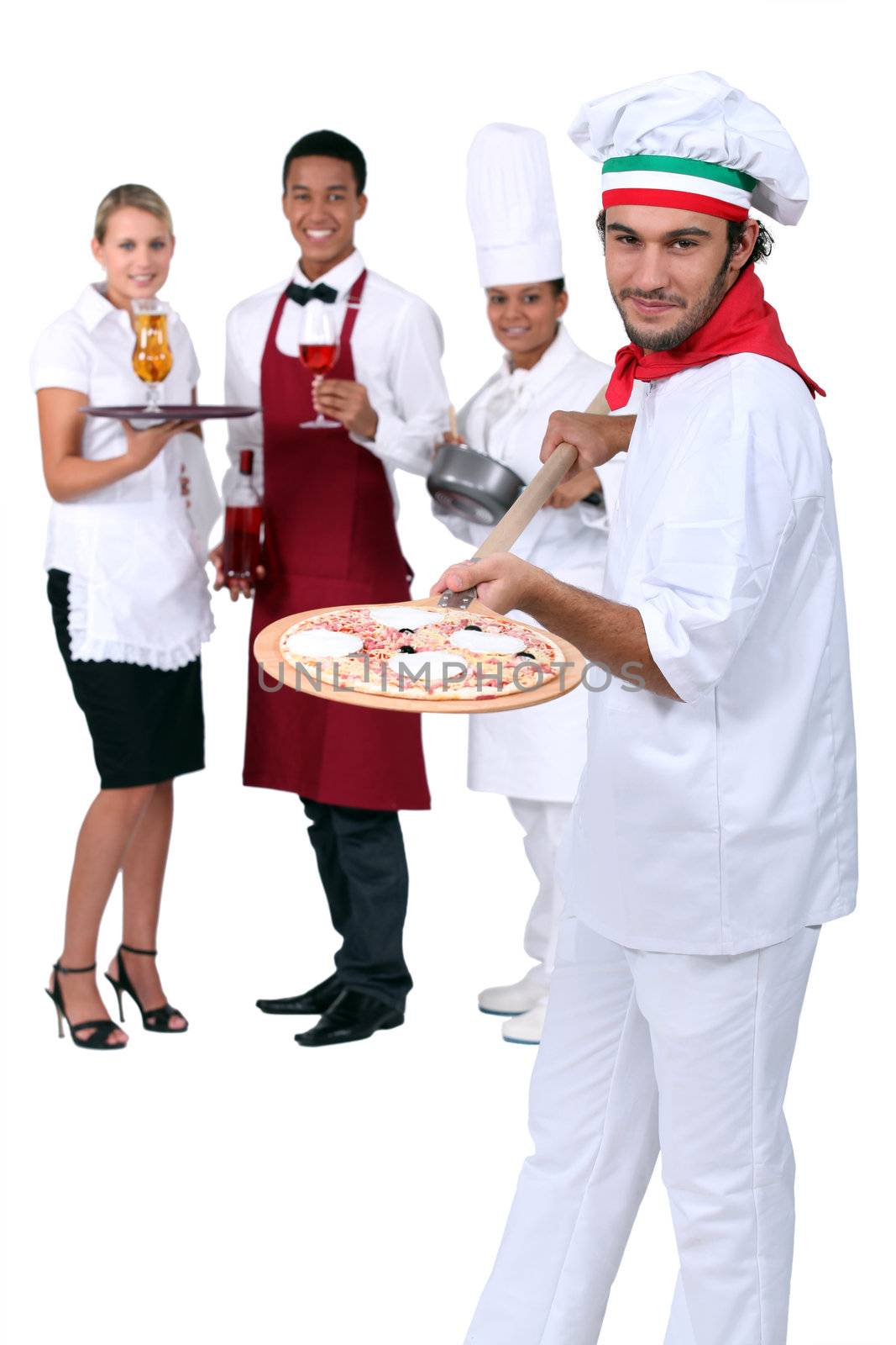 Italian pizza chef and restaurant staff by phovoir