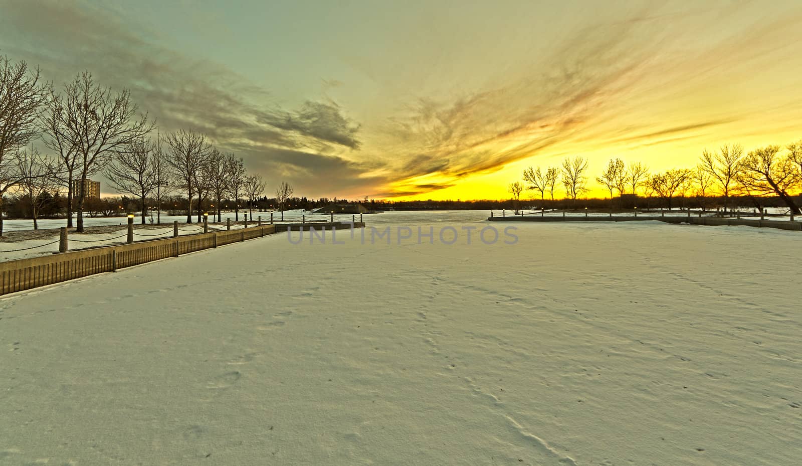 Wascana lake frozen on a cold November day during winter in Regina, Canada.