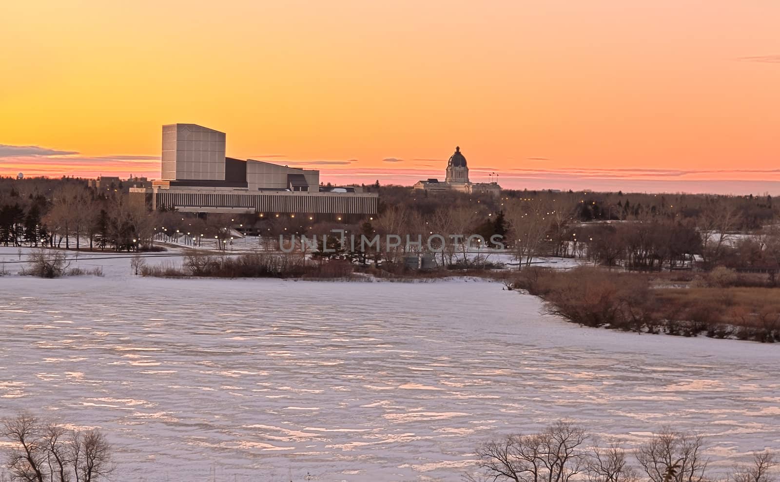 Wascana lake frozen on a cold November day during winter in Regina, Canada.