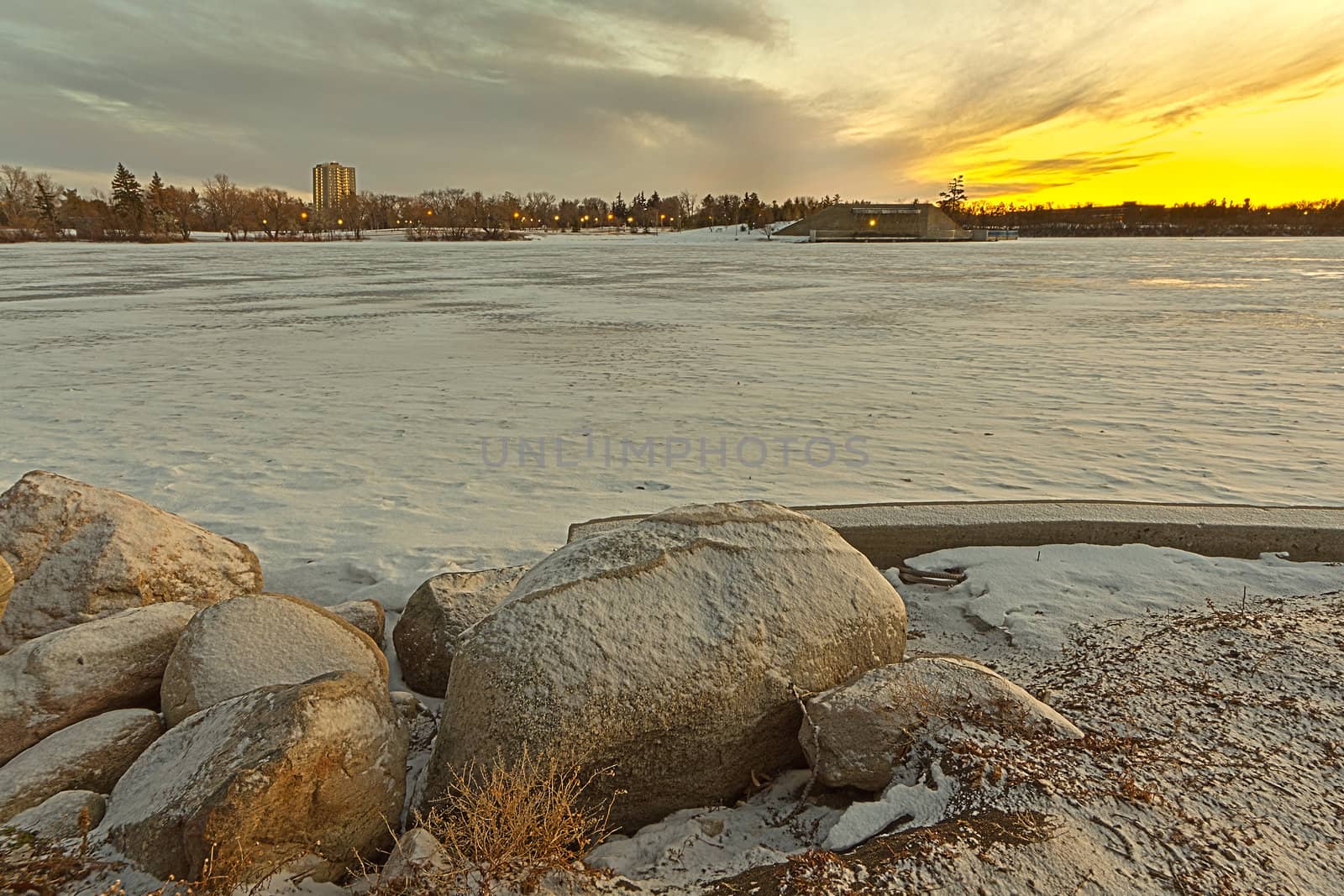 Wascana lake frozen on a cold November day during winter in Regina, Canada.