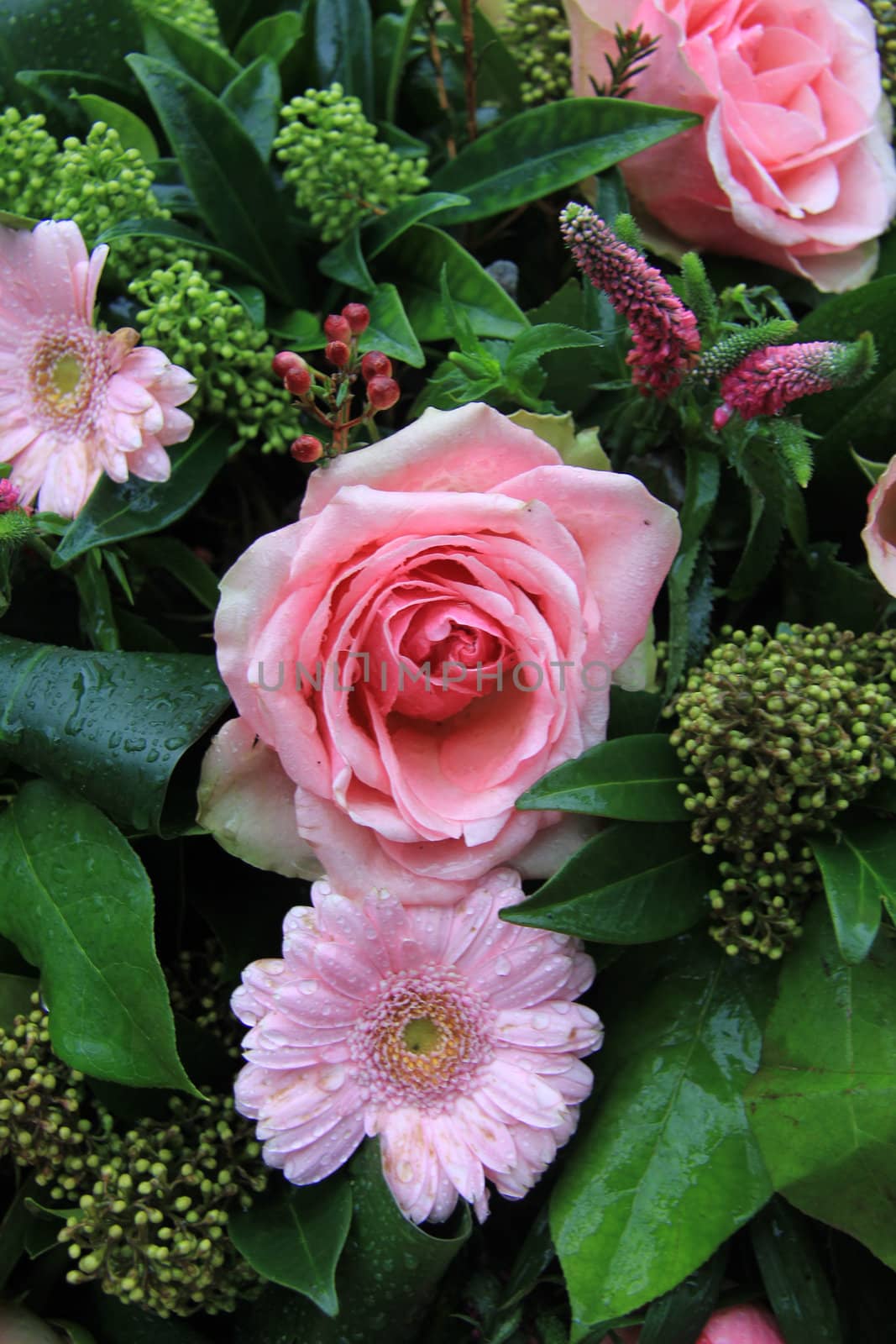 mixed pink flower arrangement with waterdrops by studioportosabbia