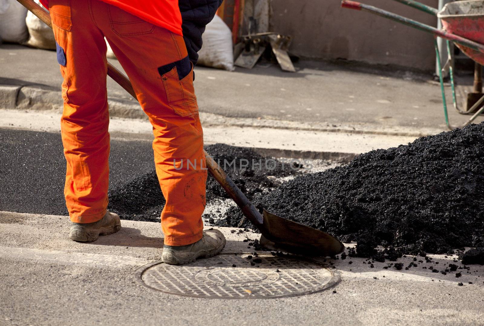 Workers of the Asphalt in the street