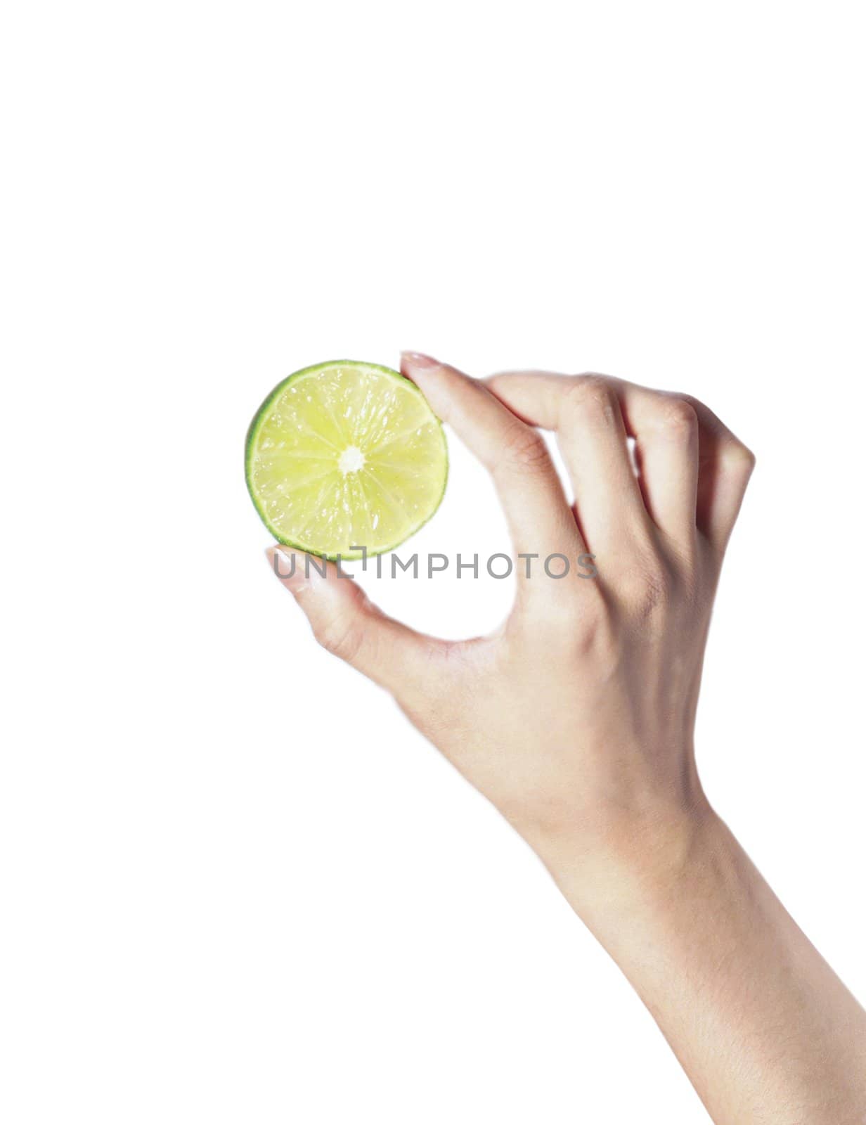 fresh ripe lime in hand on white background