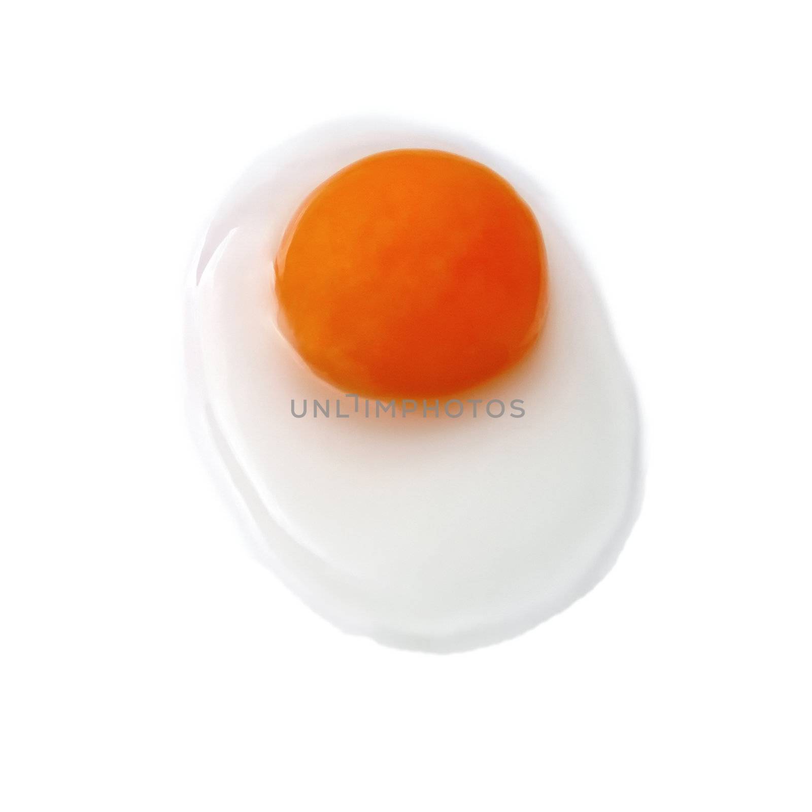 Egg yolk on a white background by ozaiachin