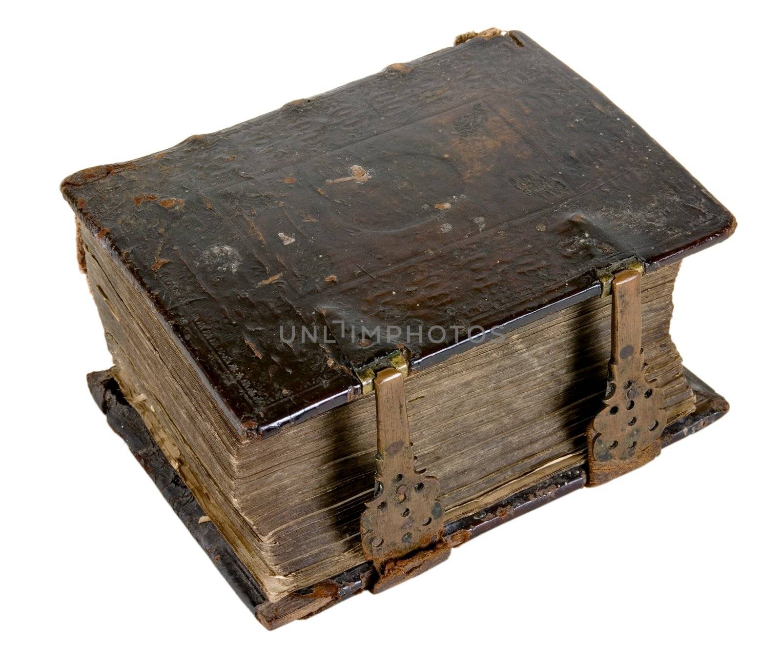 The ancient book in leather reliure on a light background