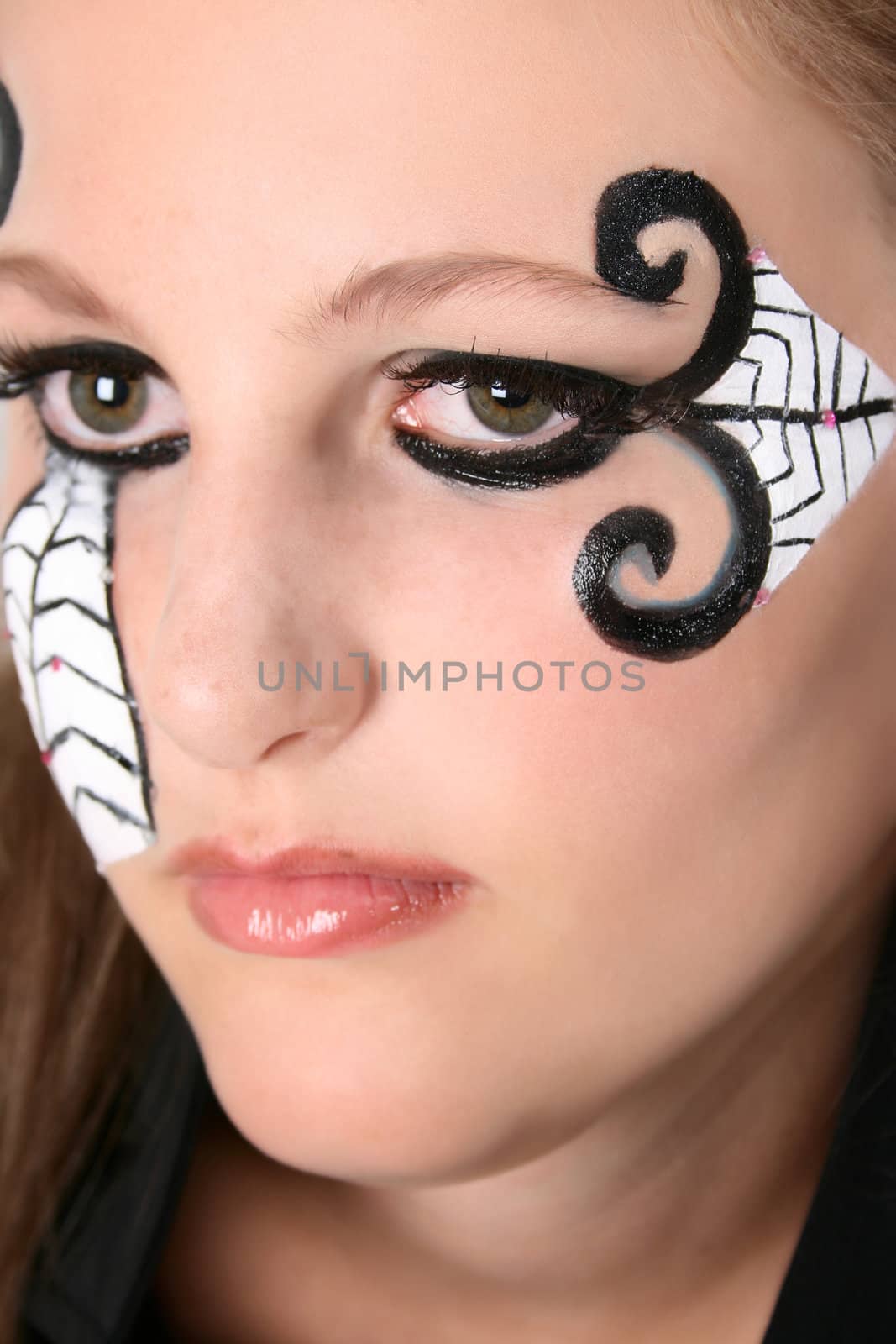 Close-up of Halloween teenager with face paint