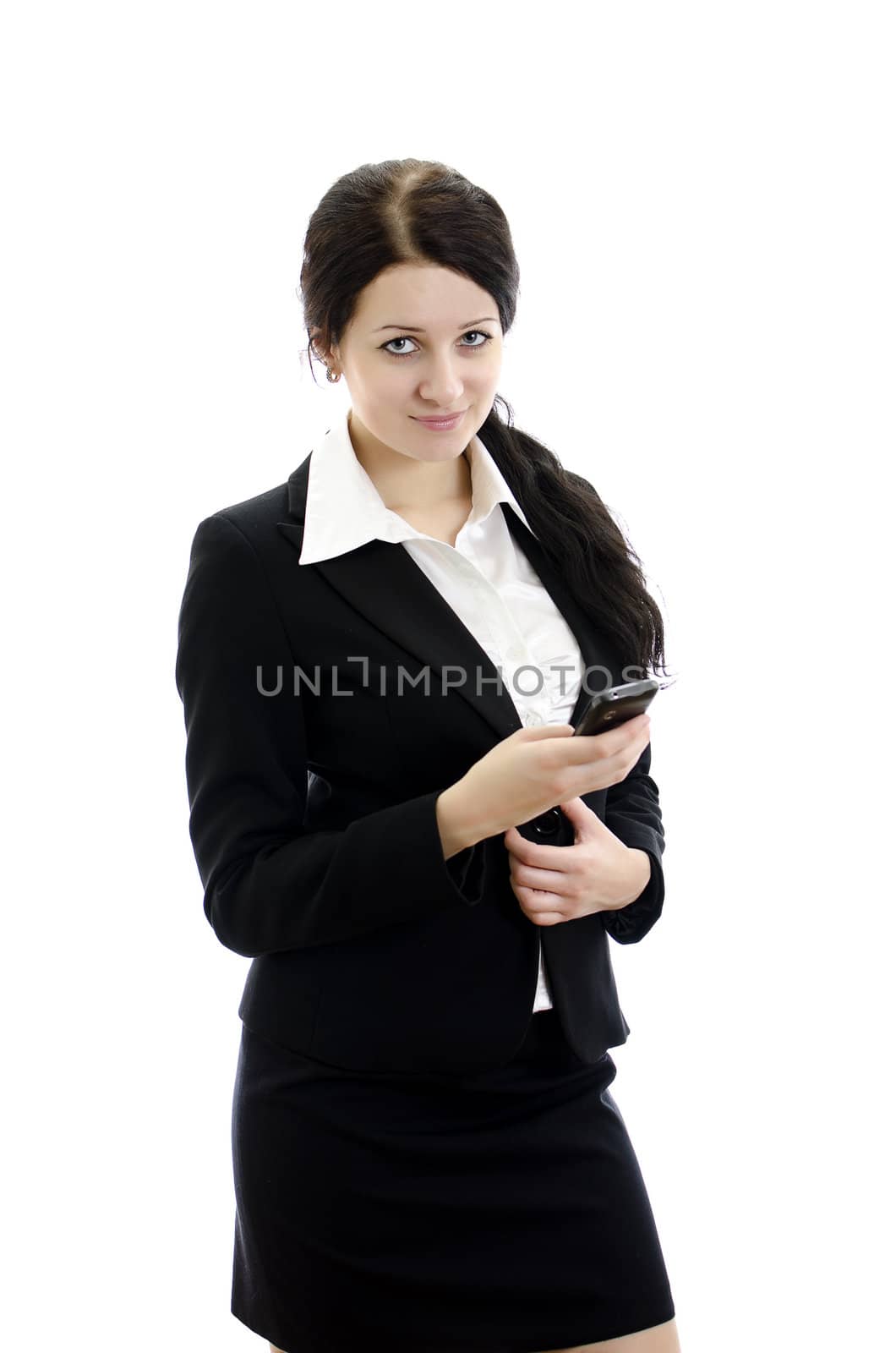 Portrait of a young attractive business woman with mobile phone. Isolated on white.