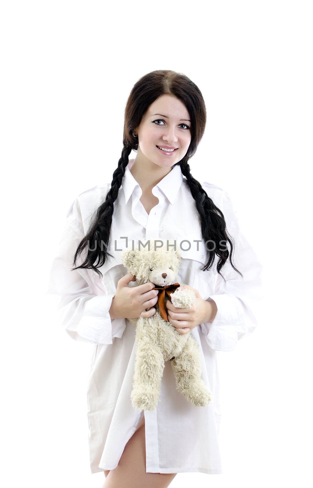 Sensual brunette girl in man's shirt with Teddy Bear. Isolated on white. by dmitrimaruta