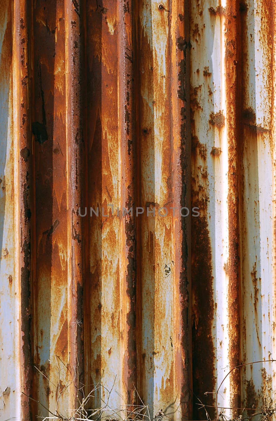 Corrugated rusty iron sheet wall detail as background