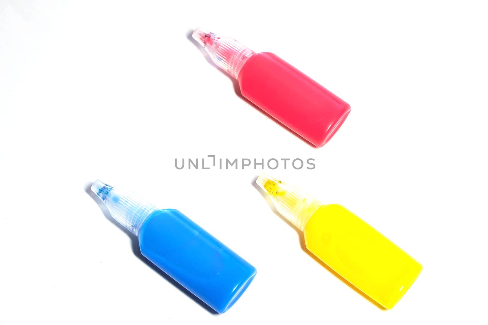 photo is tubes with red, yellow and blue colors.