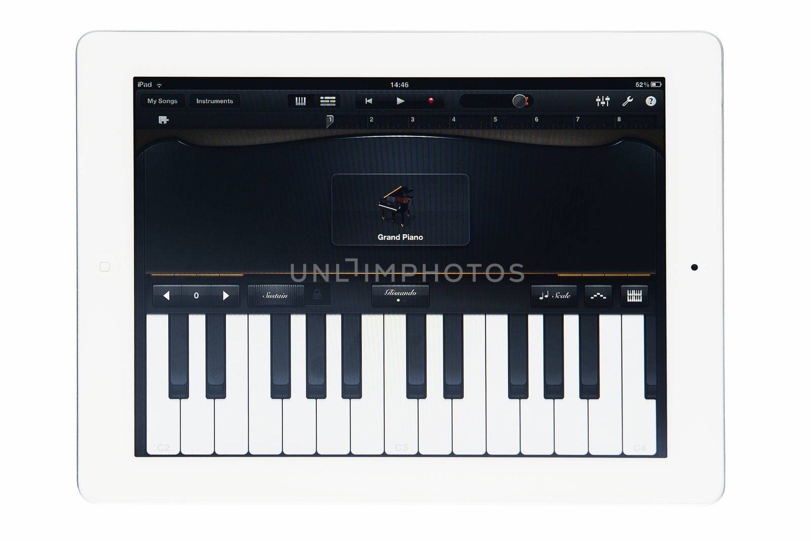 Apple iPad 2 with GarageBand music software isolated on white studio shot