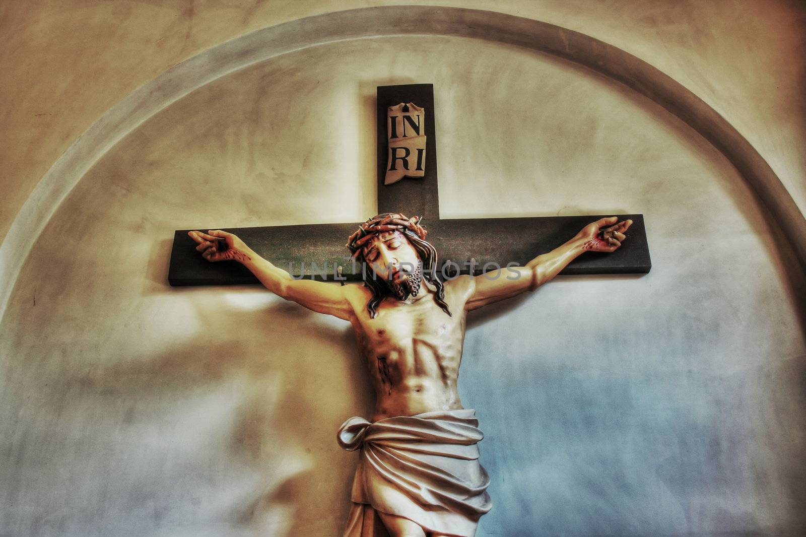 Holy cross with crucified Jesus Christ