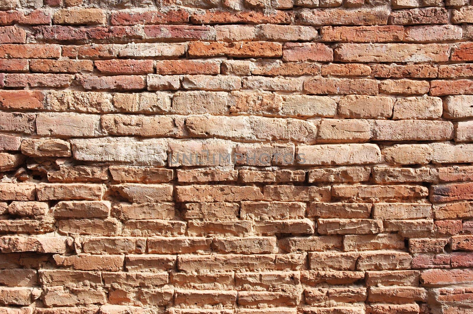 Texture of rough red brick wall surface