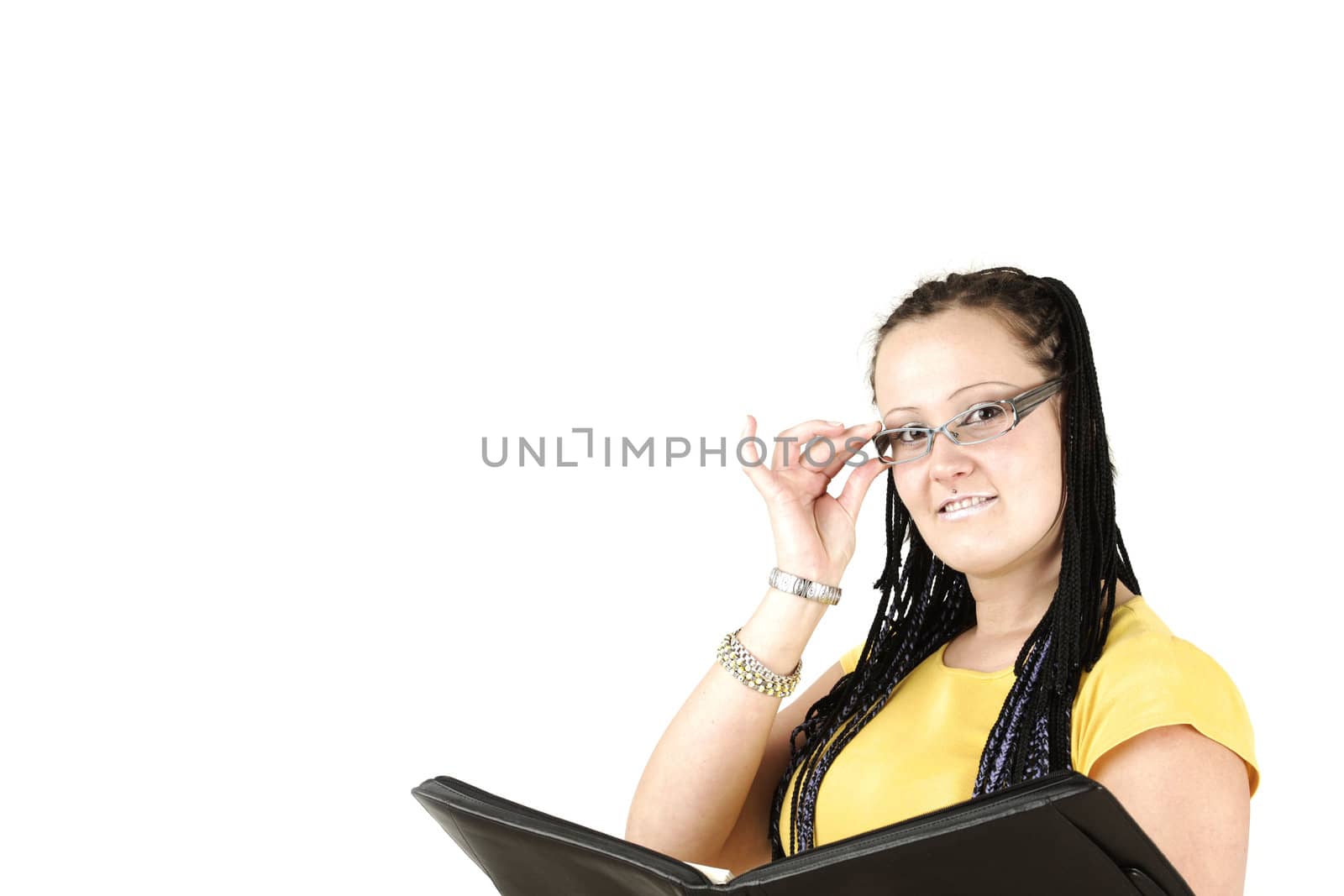 Manageress smiles behind glasses 