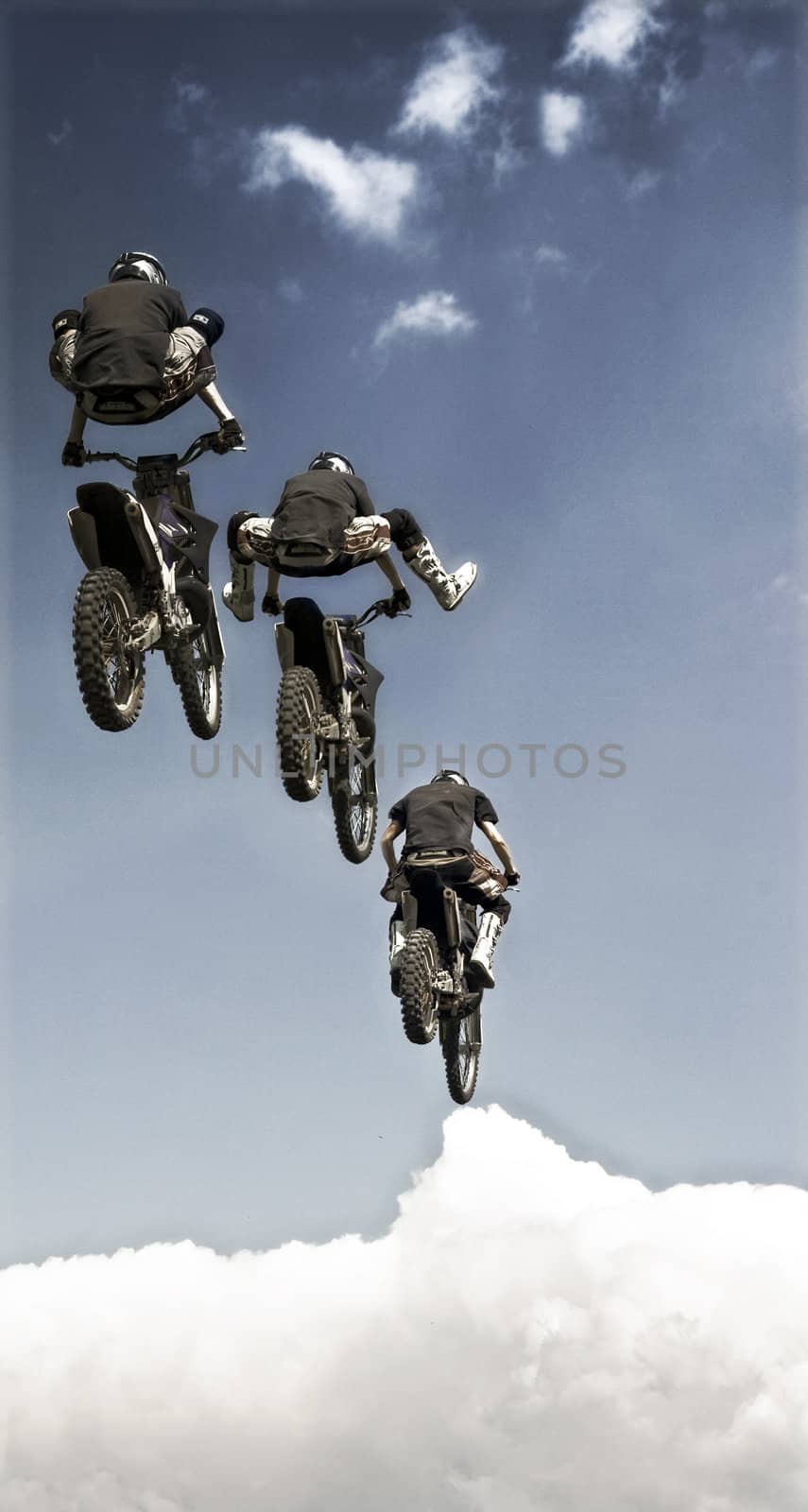 Outdoor shot, extreme rider performing a trick.