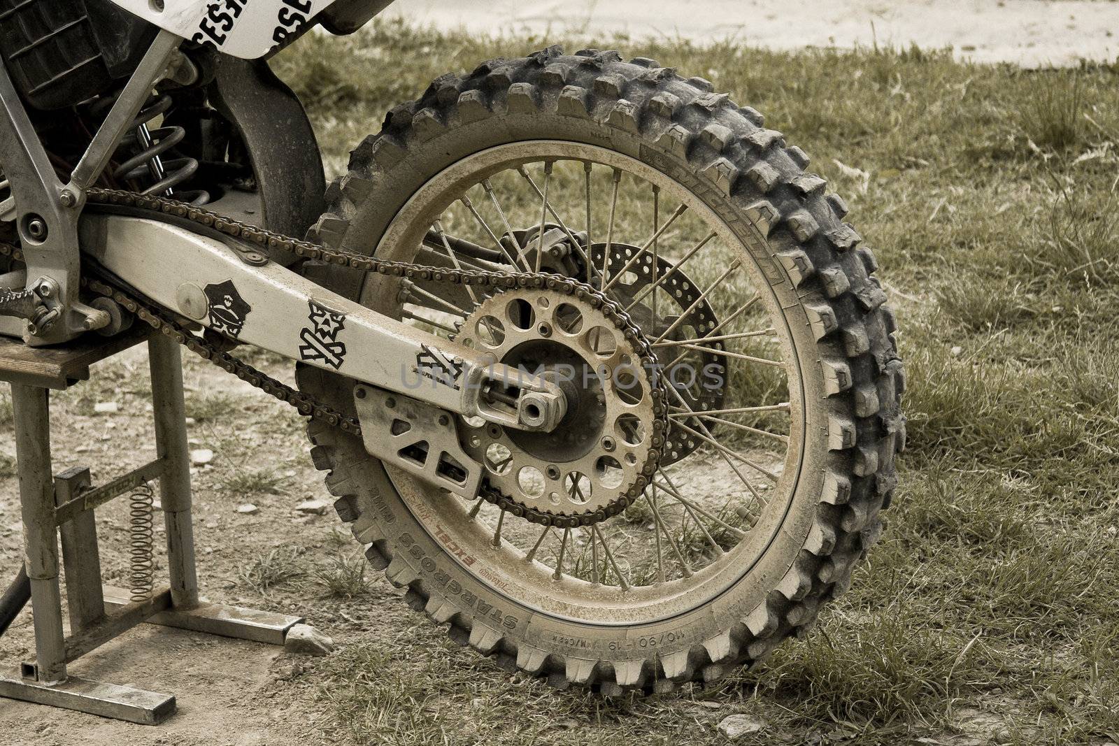 Close-up photo of a motocross bike wheel by domencolja