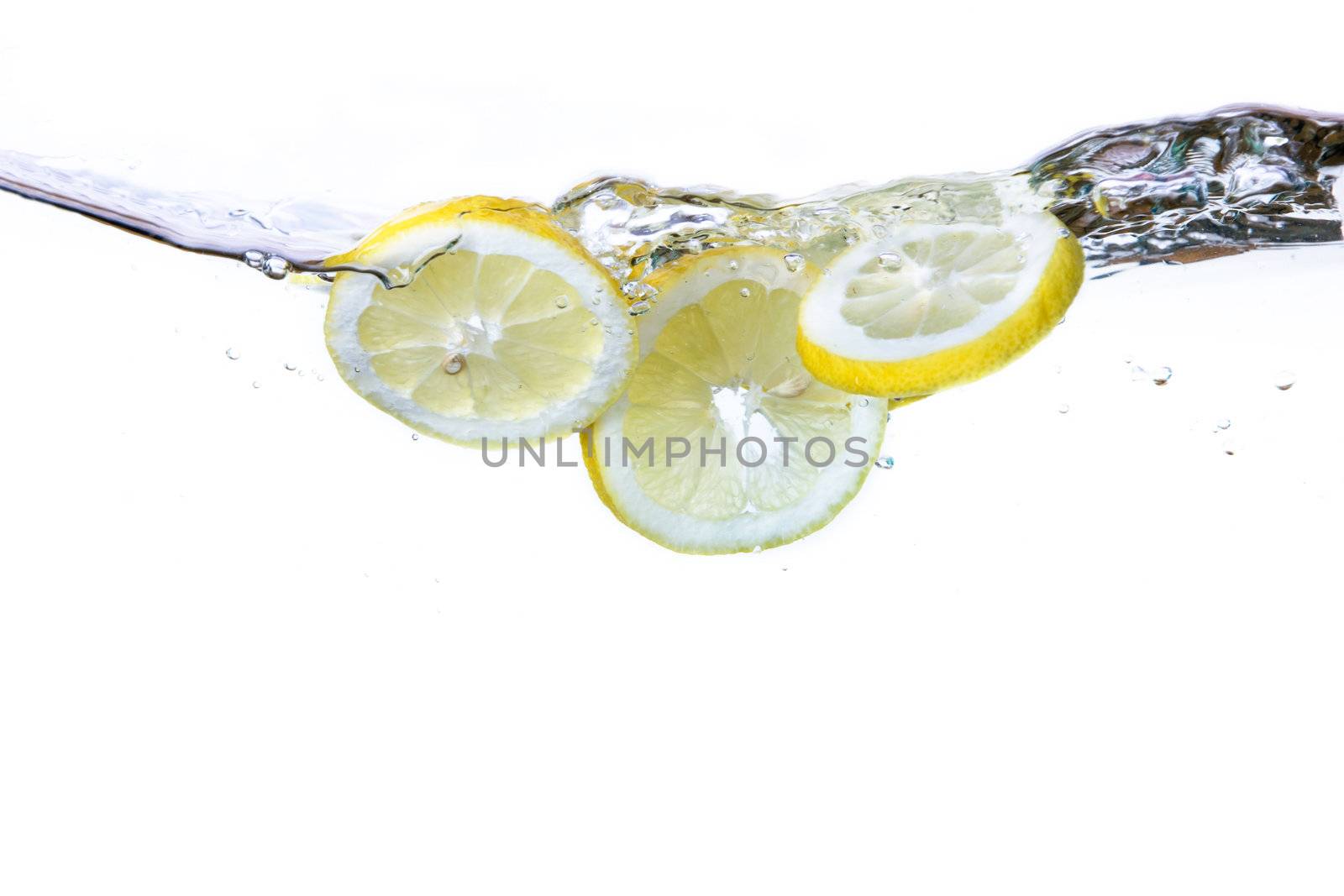 Lemon Slices and Water by leaf