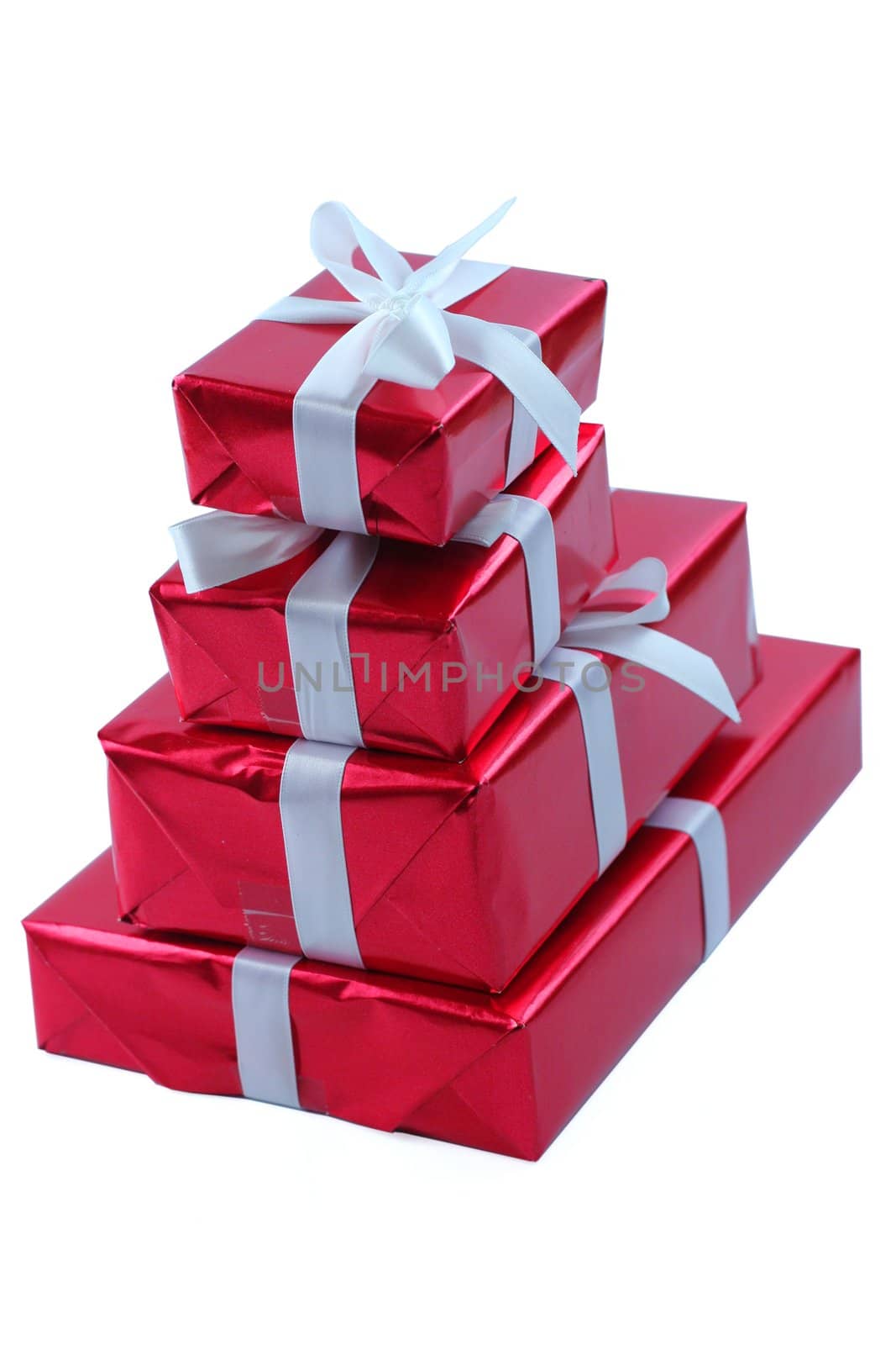 Stack of red presents isolated on white.
