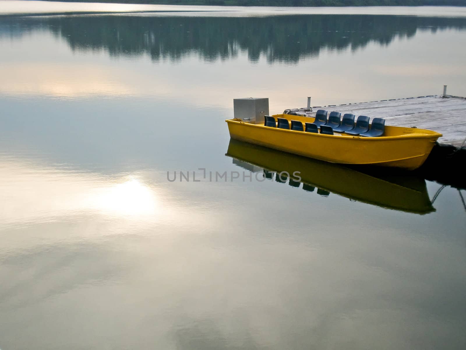 Empty boat on still water