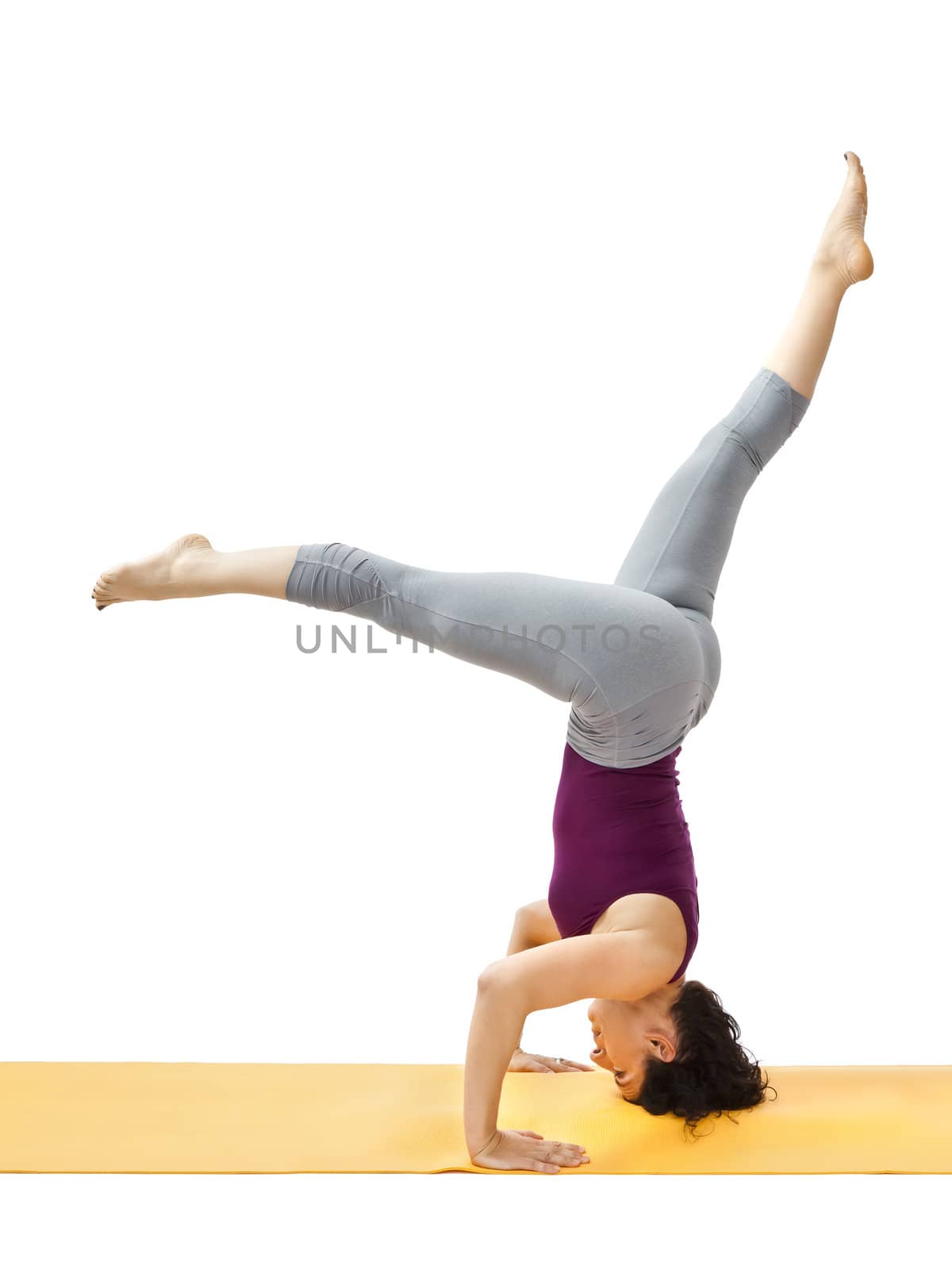 An image of a pretty woman doing yoga