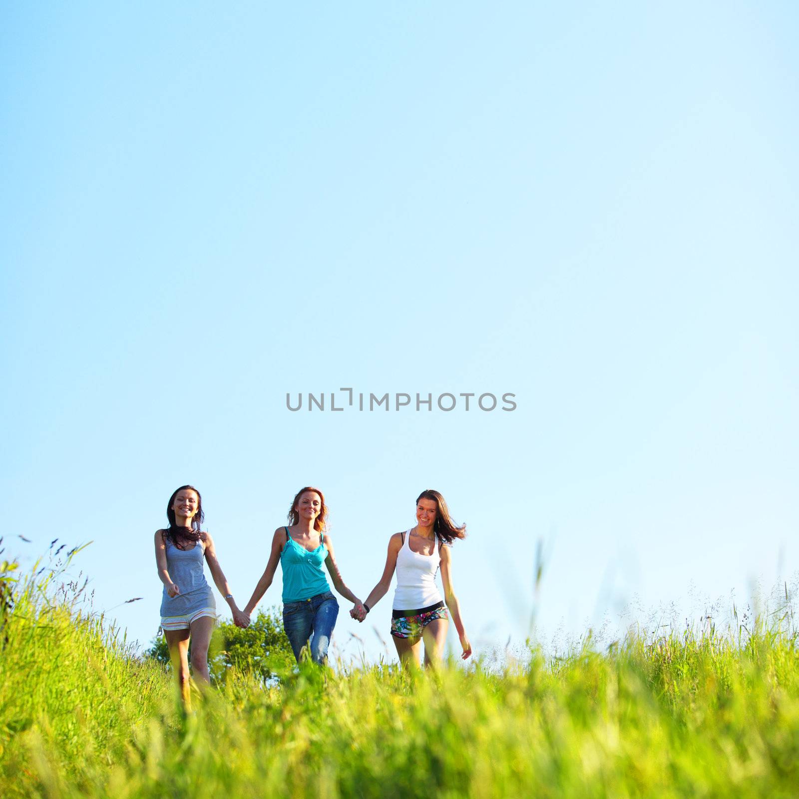 fun smile girlfriends run by green field sun is shine