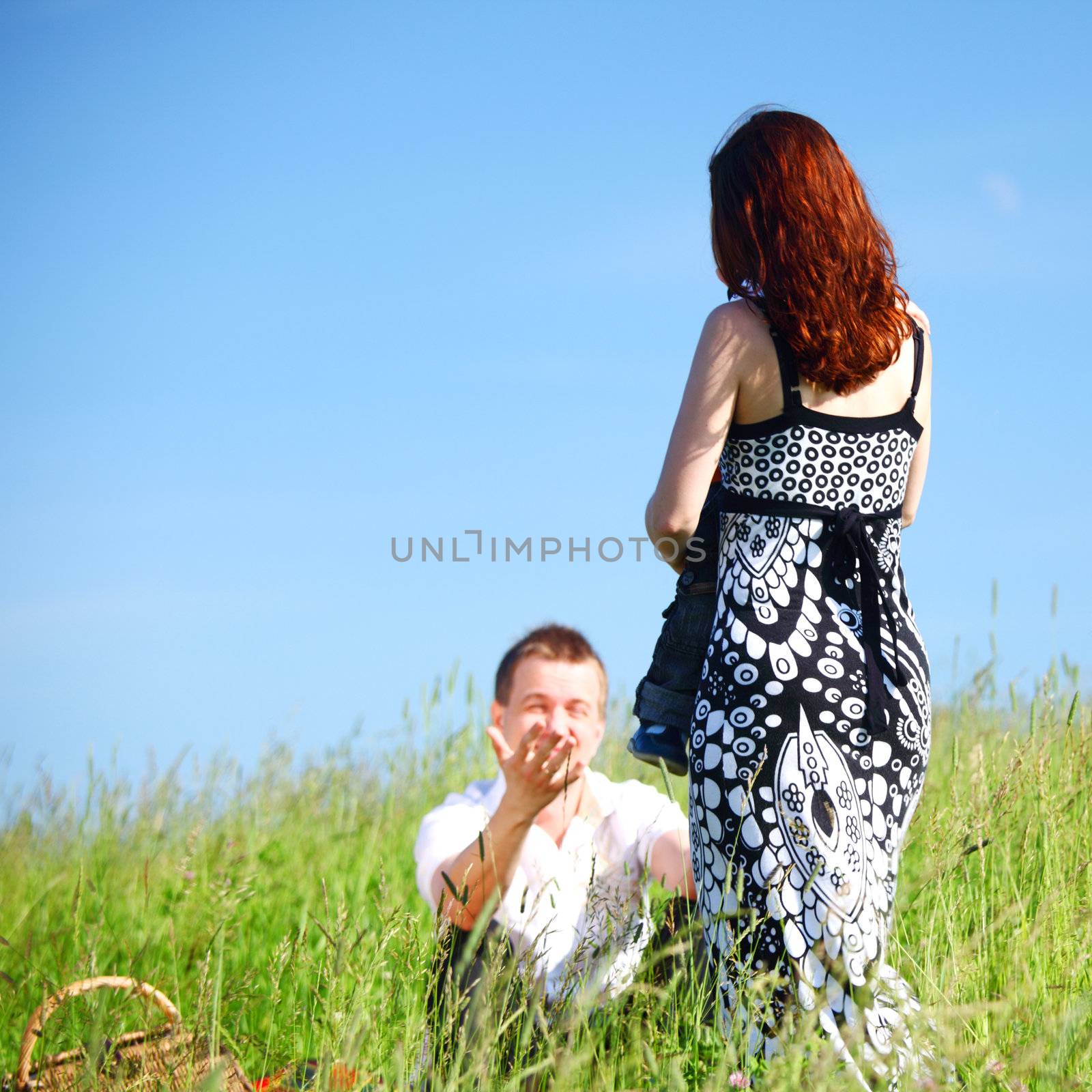 mother and take son in blue sky