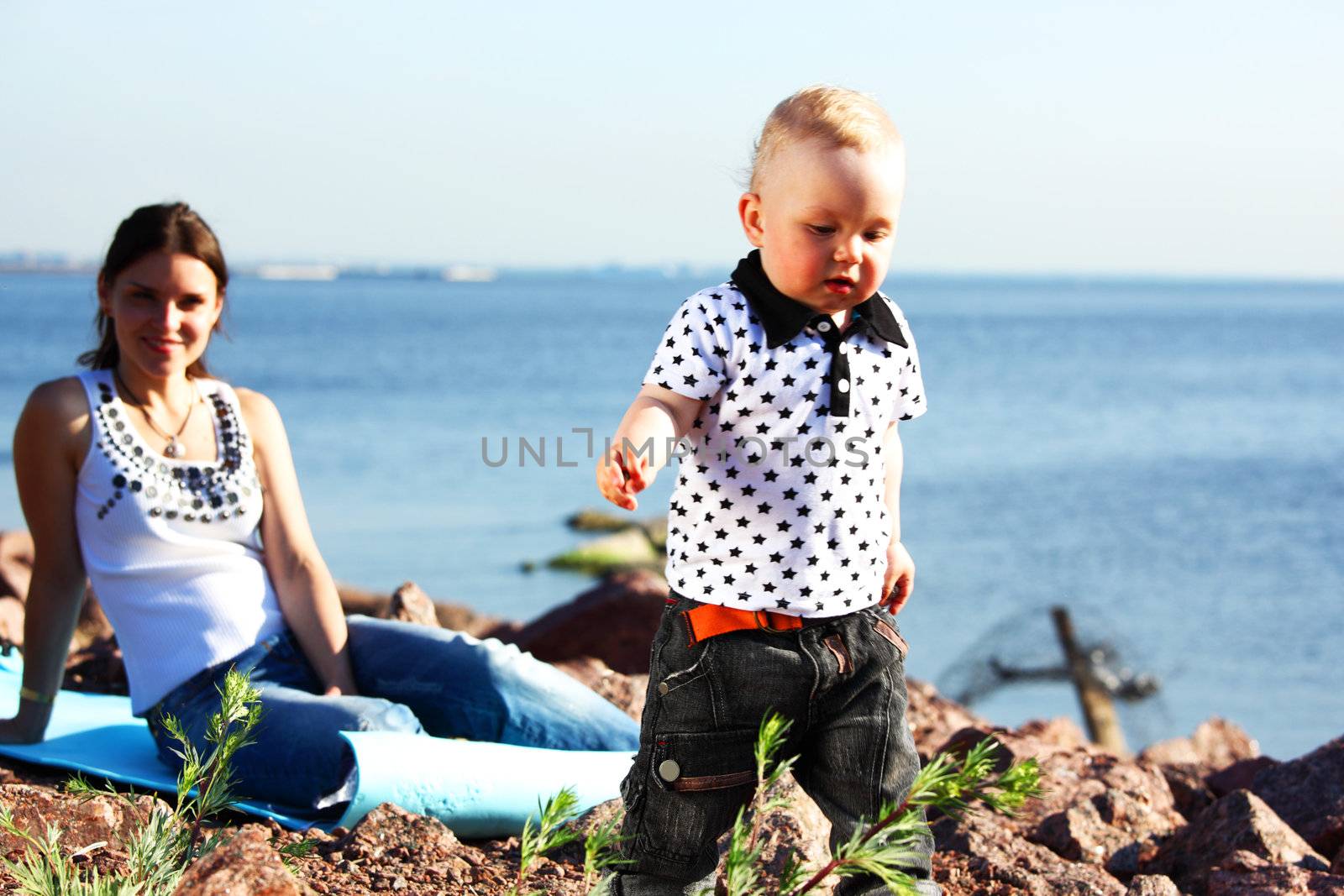 picnic of happy family near sea