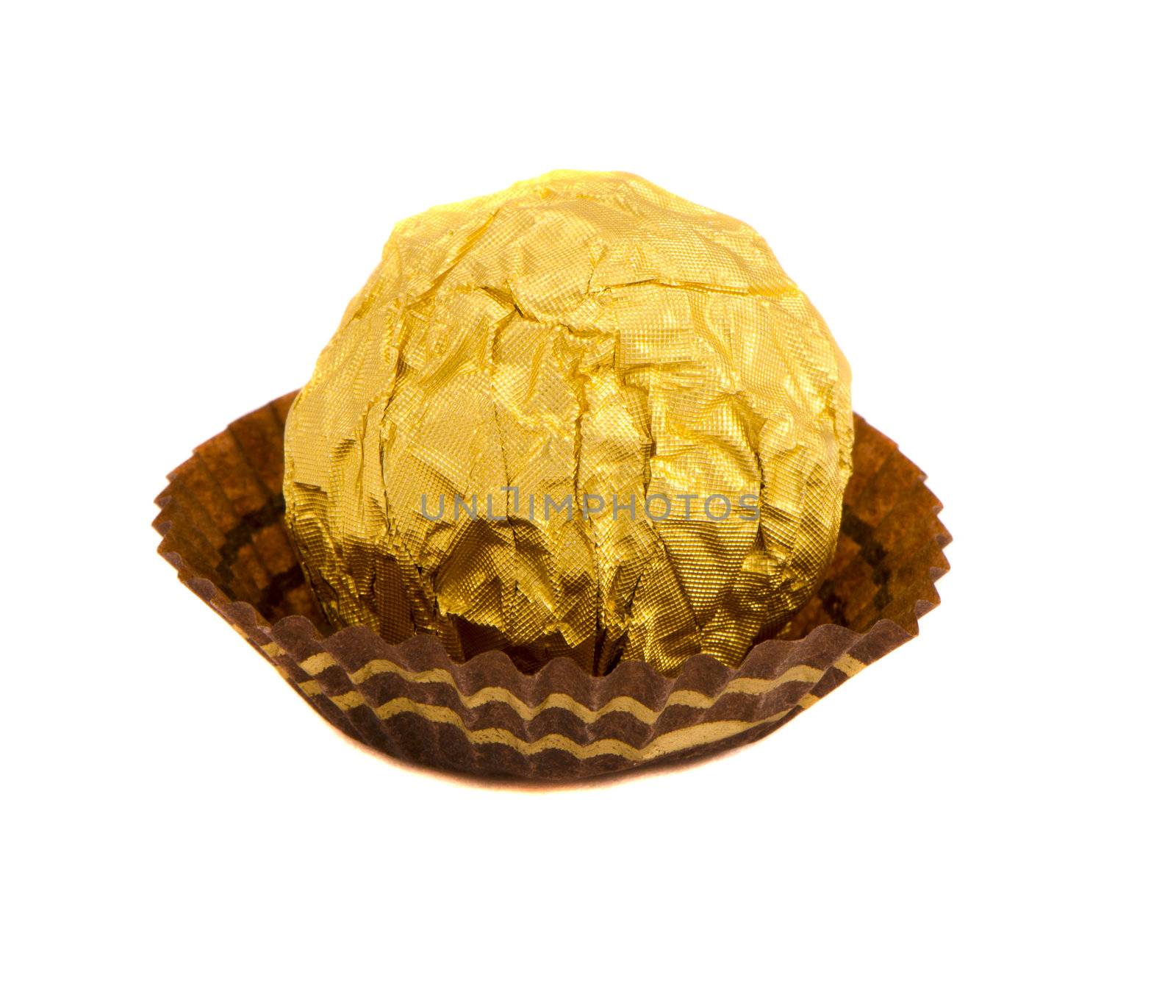 Candy isolated round sweet wrapped gold foil by sauletas