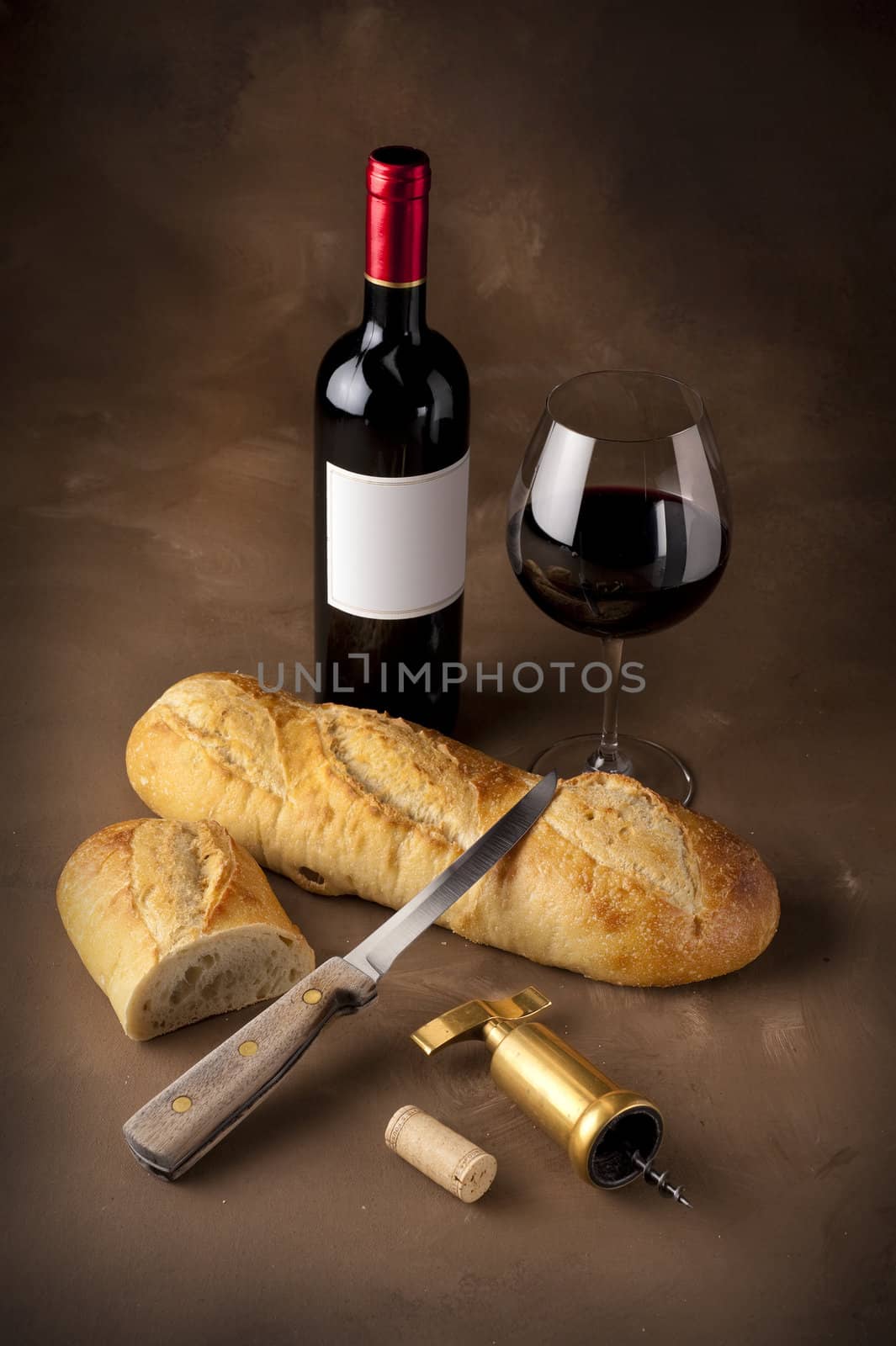 Wine and bread still life by f/2sumicron