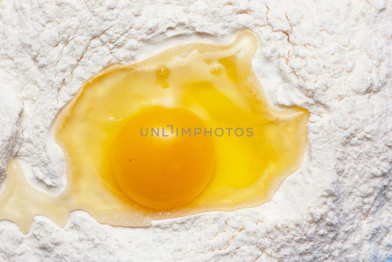 Backing ingredients: broken egg in a flour