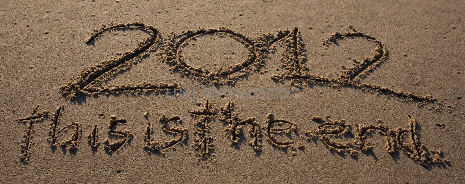 2012 this is the end written on the beach