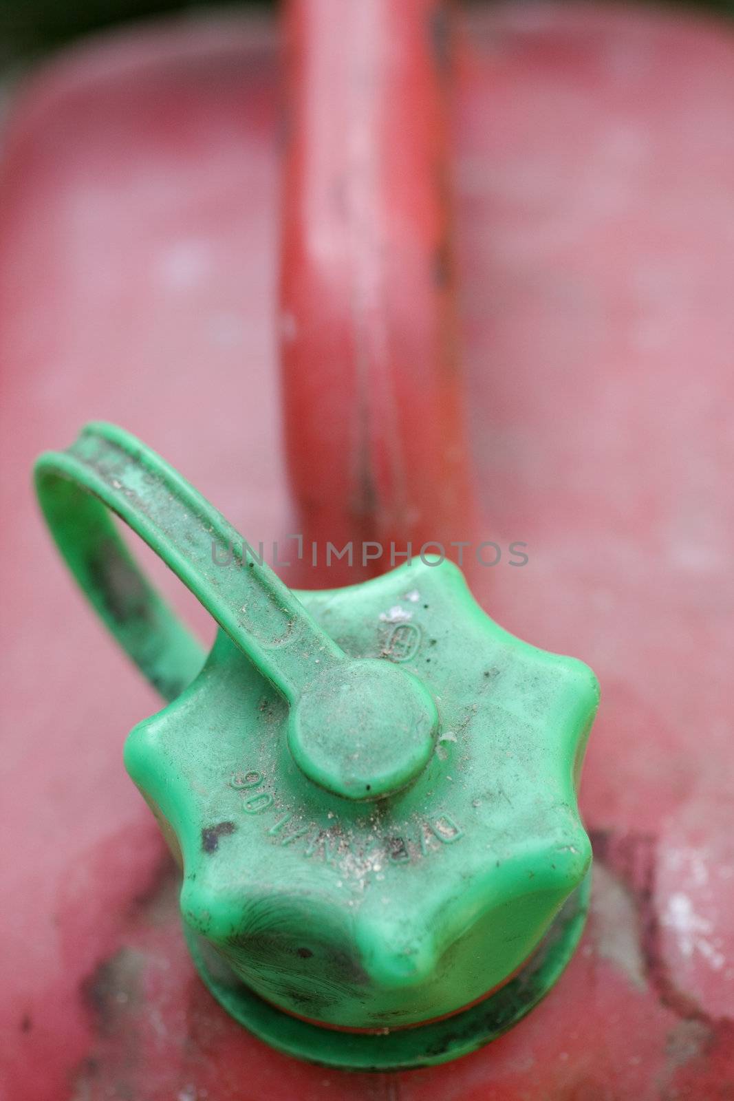 Plastic cap of a red petrol can