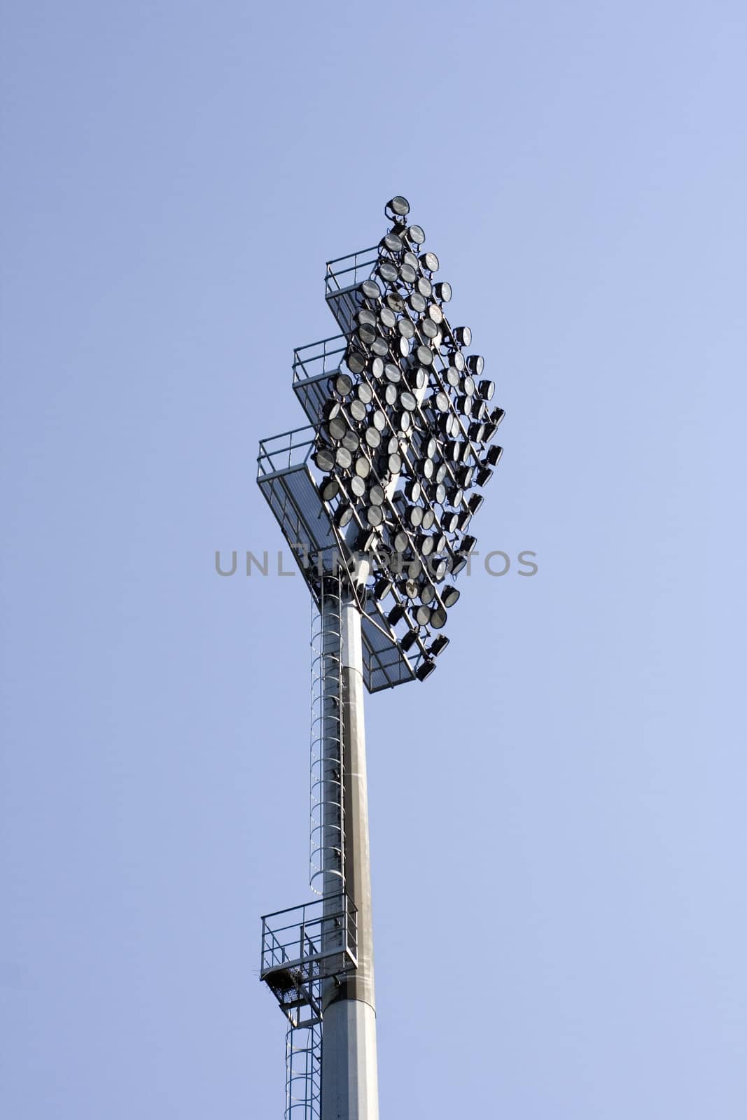 Stadium lights on sky background