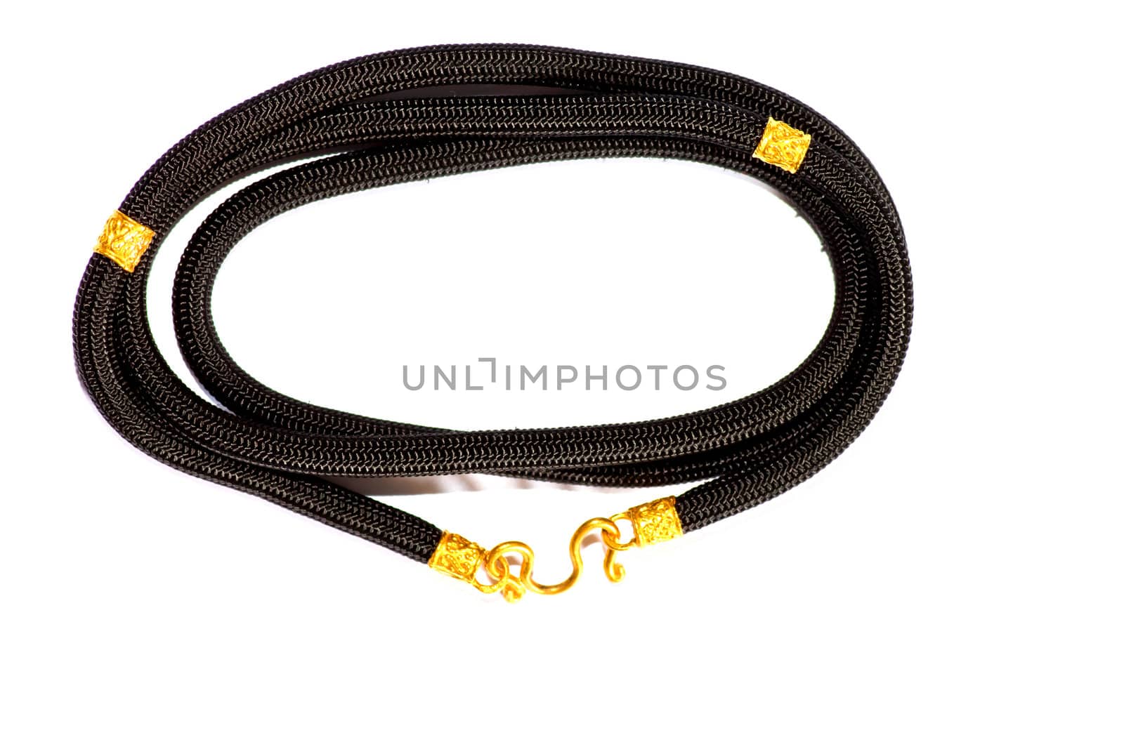 Black and gold rope on a white background.