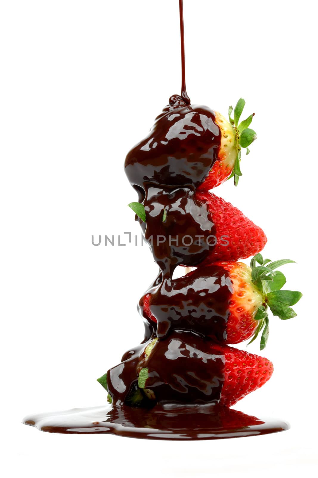 strawberry stack in chocolate  isolated on white