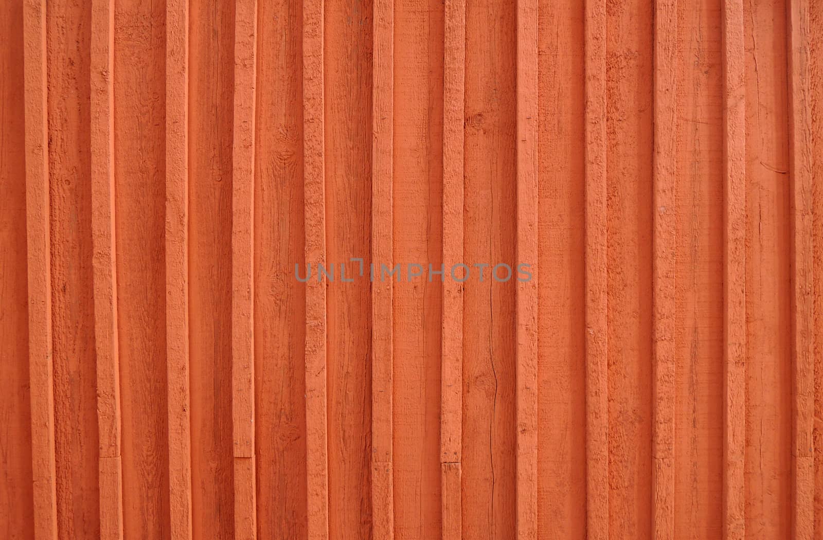 Background image of a wooden wall painted in bright red color