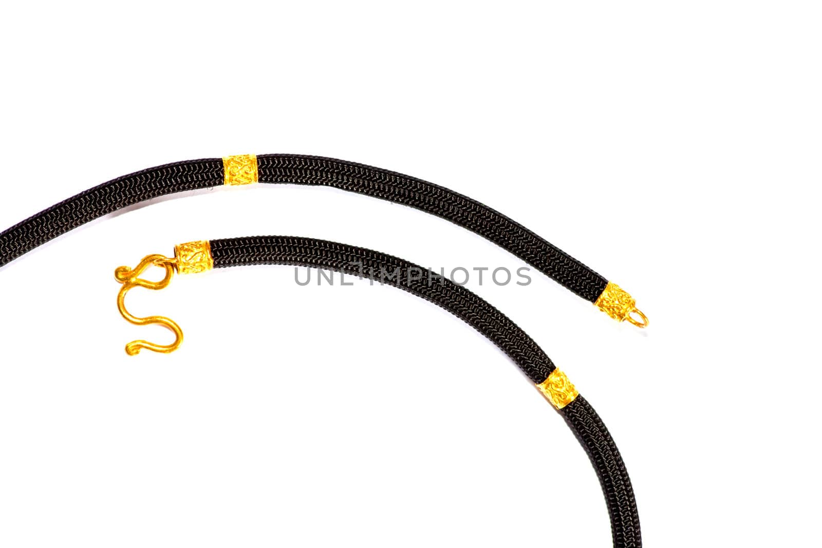 Black and gold rope on a white background.