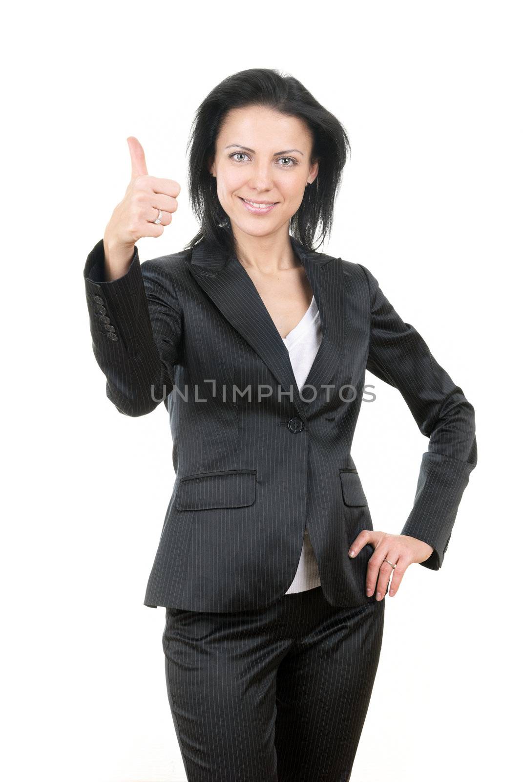 Glad businesswoman in official costume with OK sign