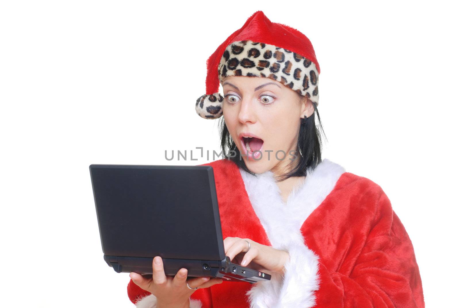 Surprised lady in Santa Claus costume reading email message