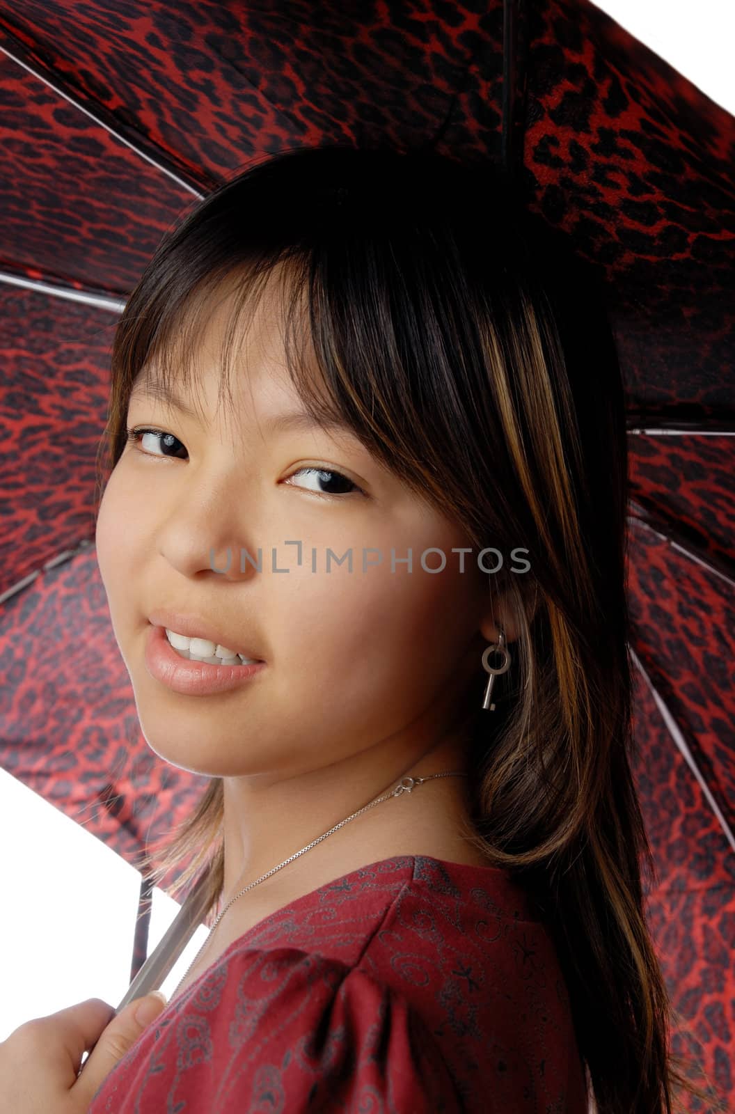 Photo of the young smiling model with umbrella